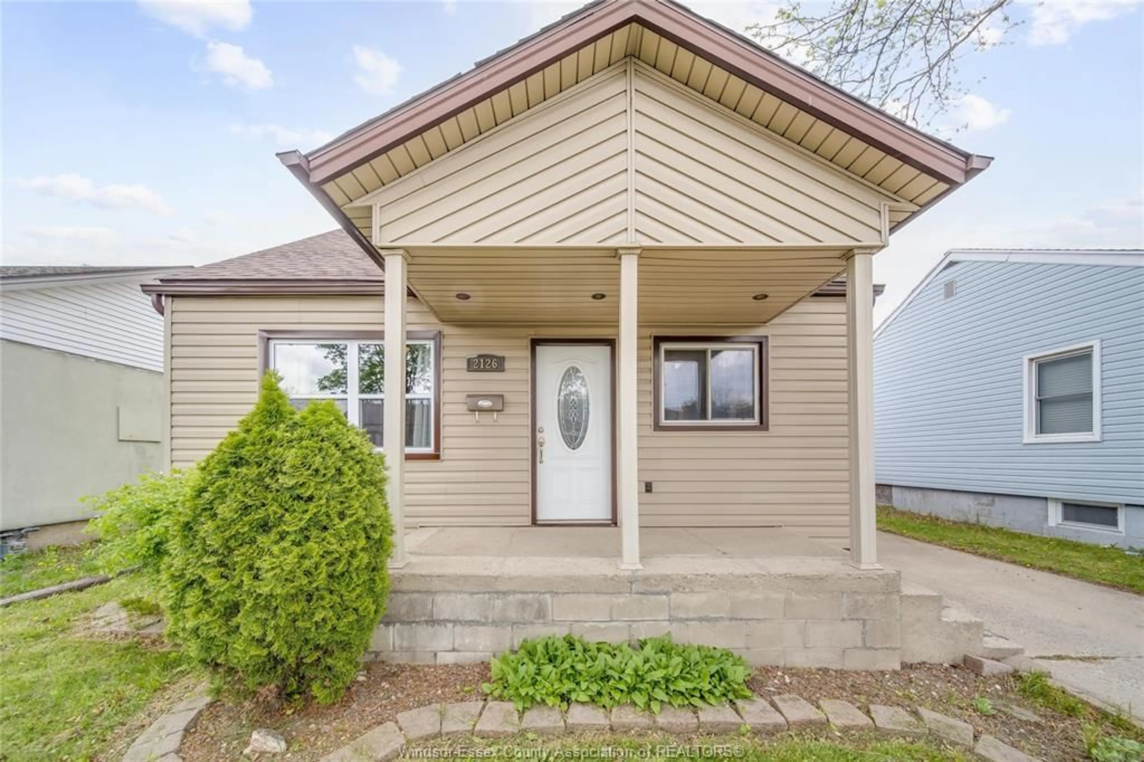 Home with vinyl exterior material, street for 2126 FOREST Ave, Windsor Ontario N8W 2G5