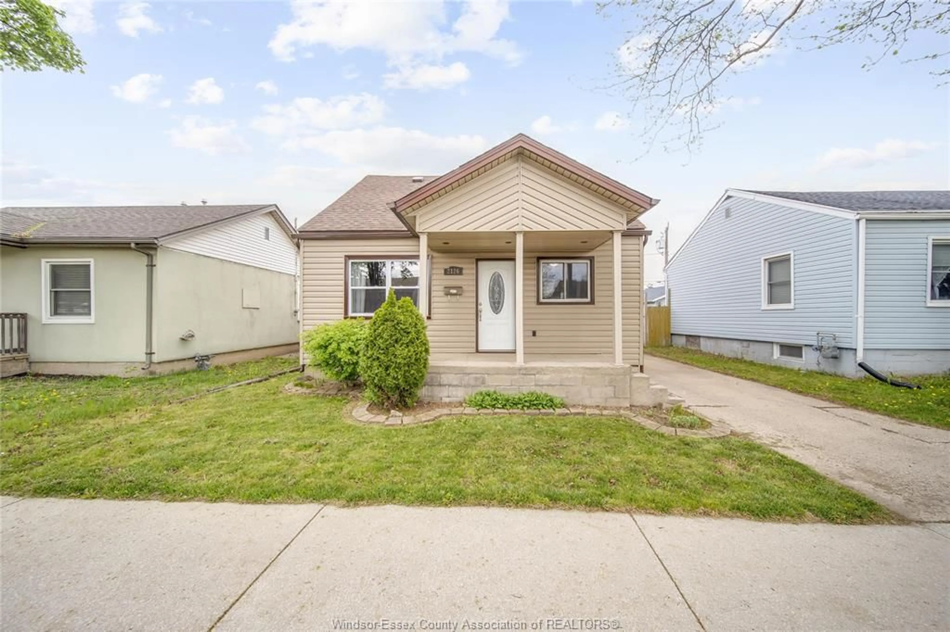 Home with vinyl exterior material, street for 2126 FOREST Ave, Windsor Ontario N8W 2G5