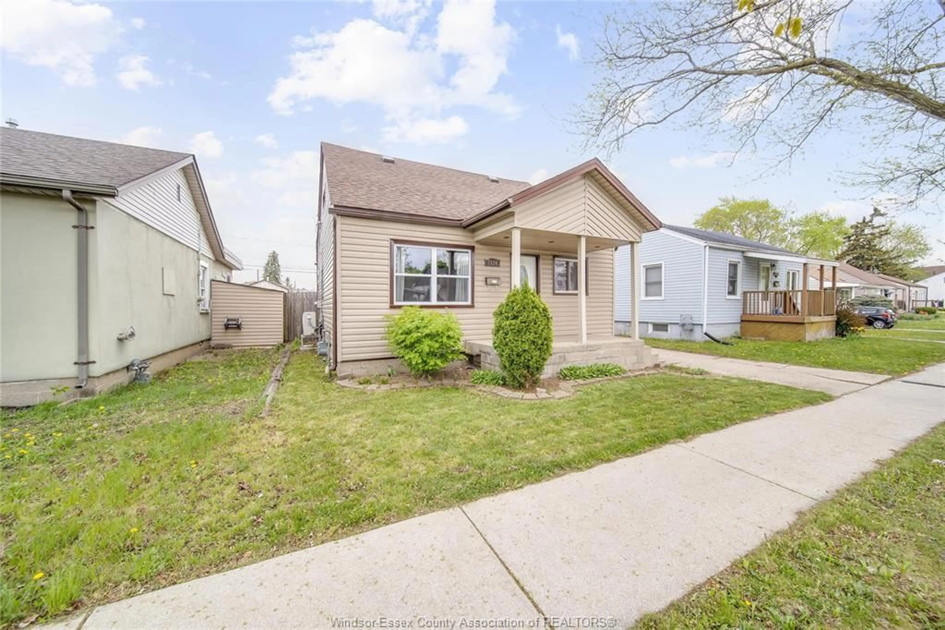 Home with vinyl exterior material, street for 2126 FOREST Ave, Windsor Ontario N8W 2G5