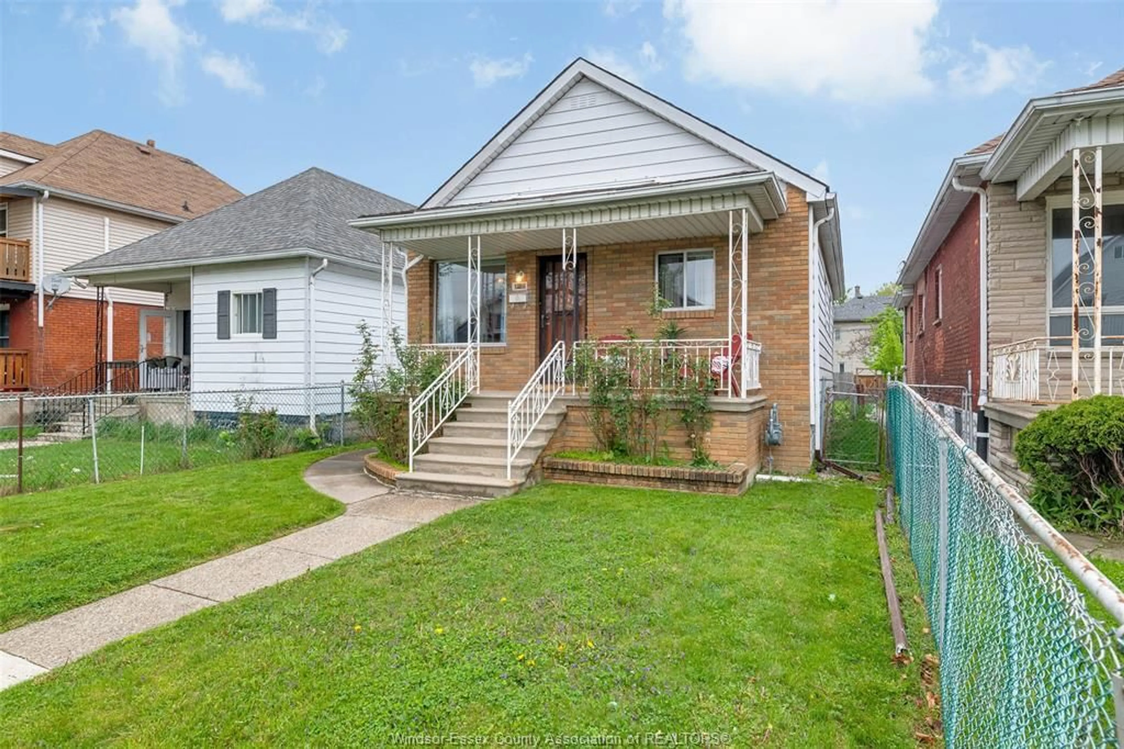 Home with brick exterior material, street for 1086 MARION Ave, Windsor Ontario N9A 2J4
