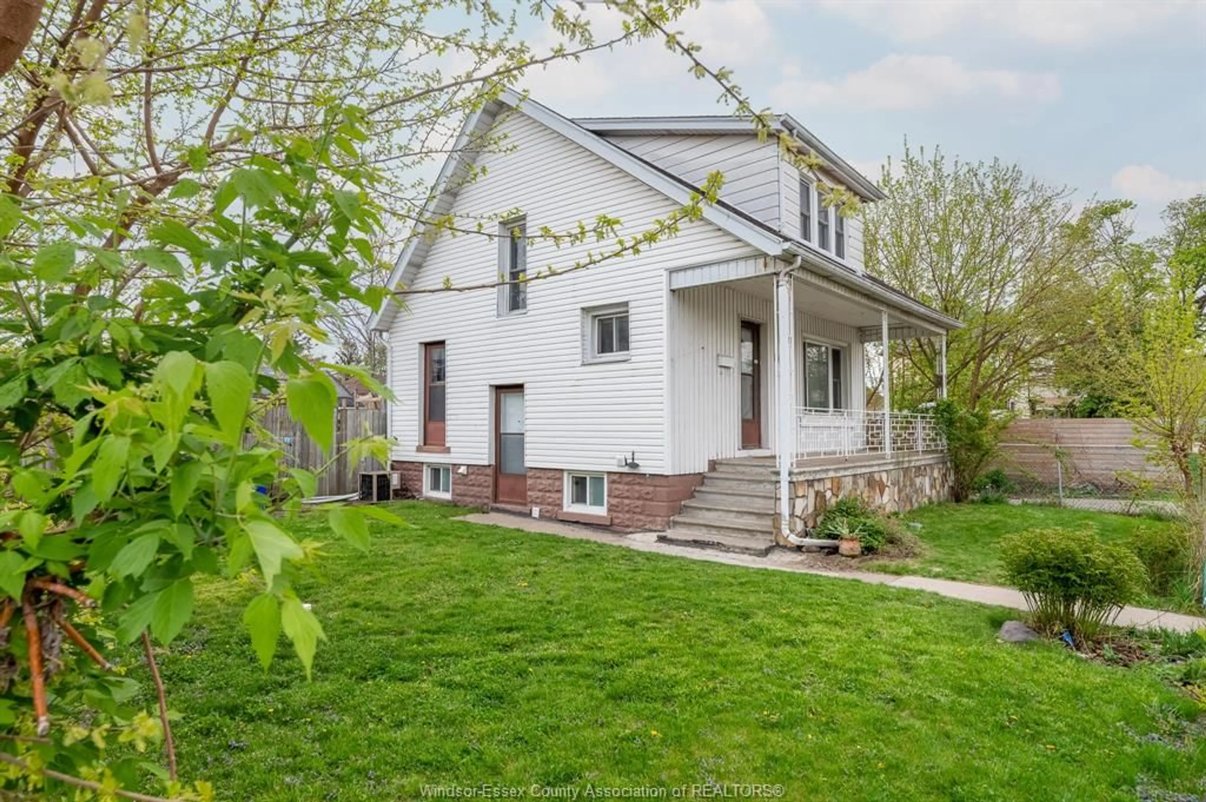 Home with brick exterior material, street for 1259 CATARAQUI, Windsor Ontario N9A 3R2