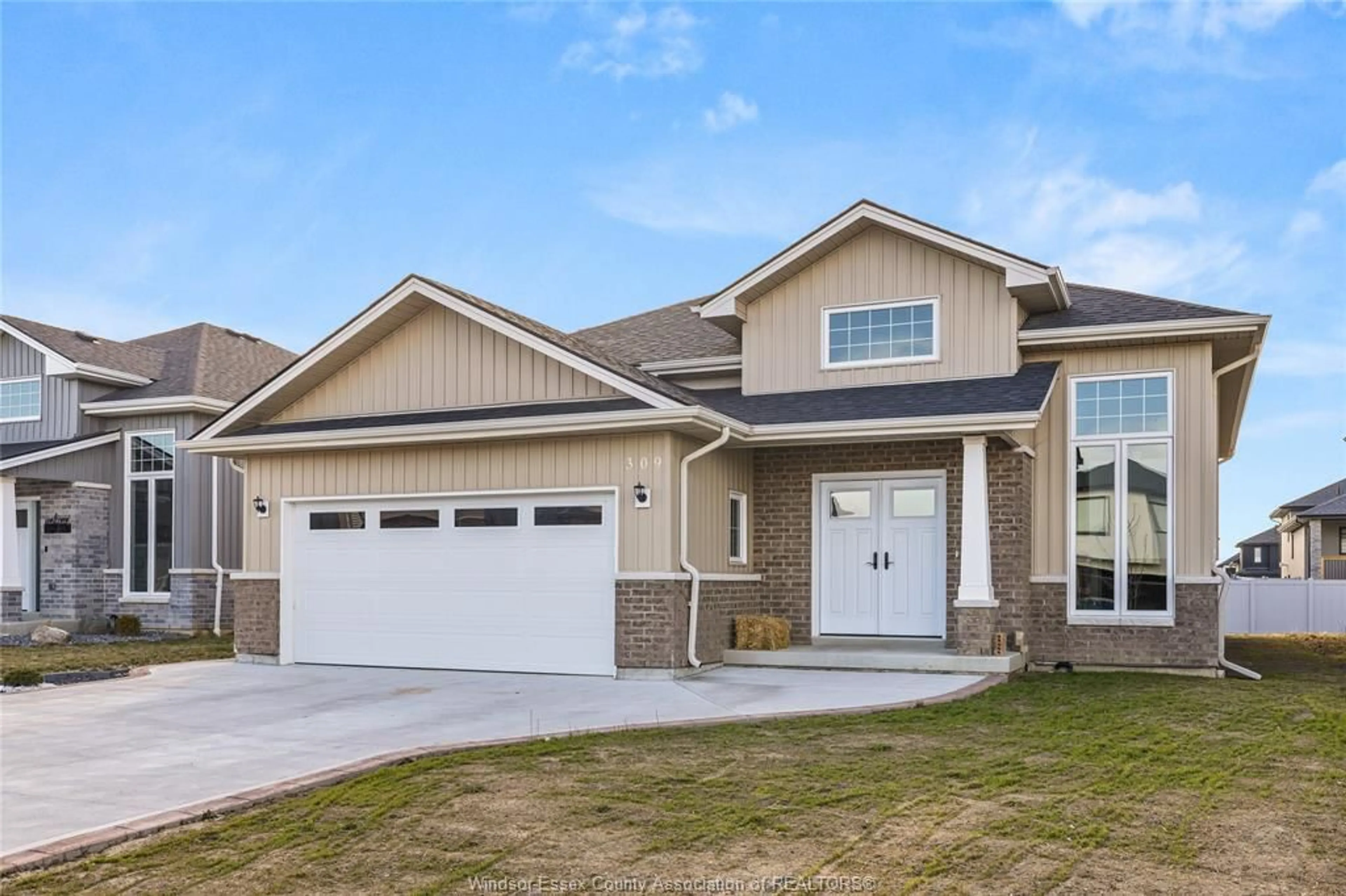 Home with vinyl exterior material, street for 309 MORIN Rd, Amherstburg Ontario N9V 0G8