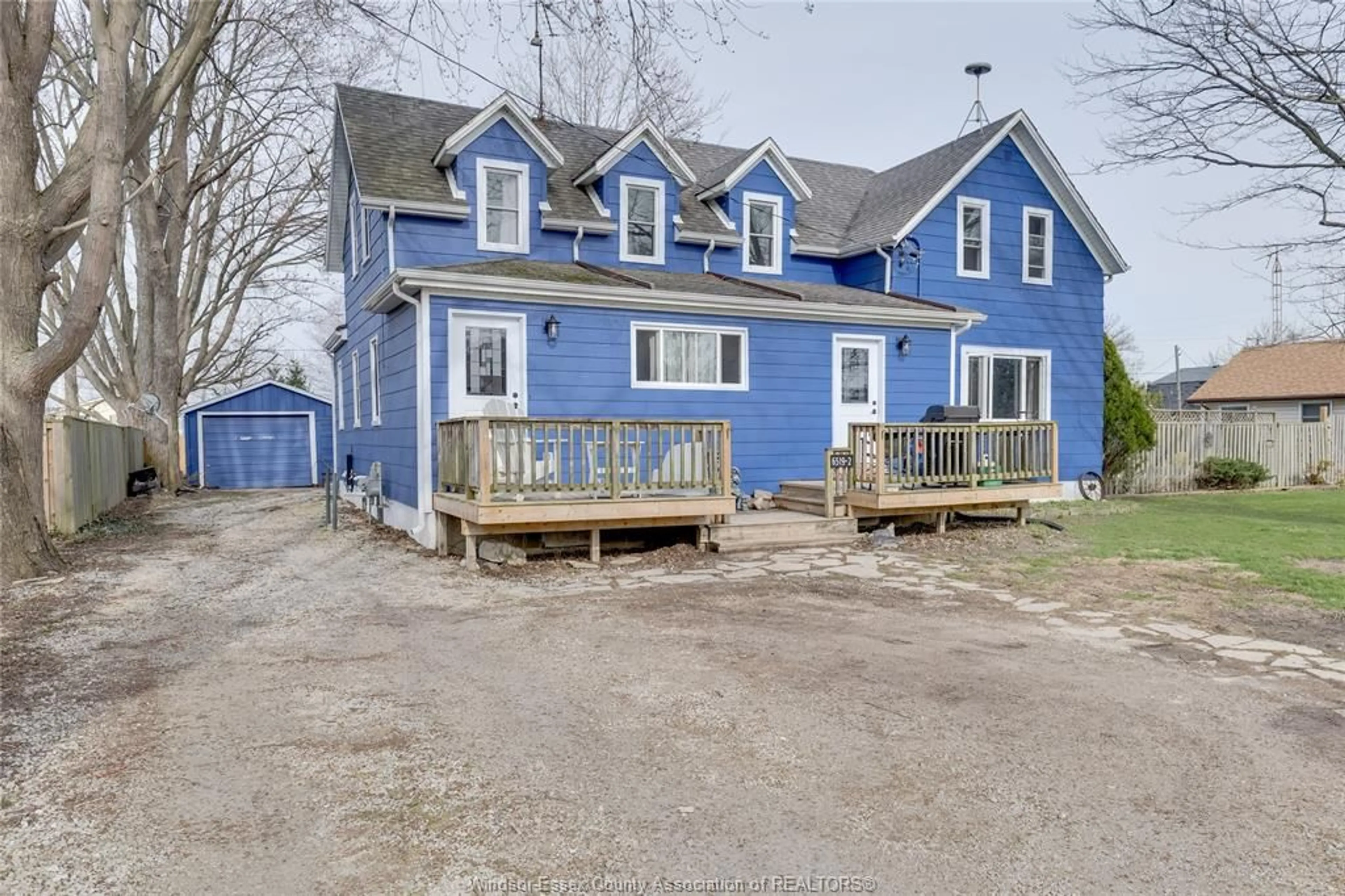 A pic from outside/outdoor area/front of a property/back of a property/a pic from drone, street for 6519 MAIN St, Lakeshore Ontario N0P 1J0