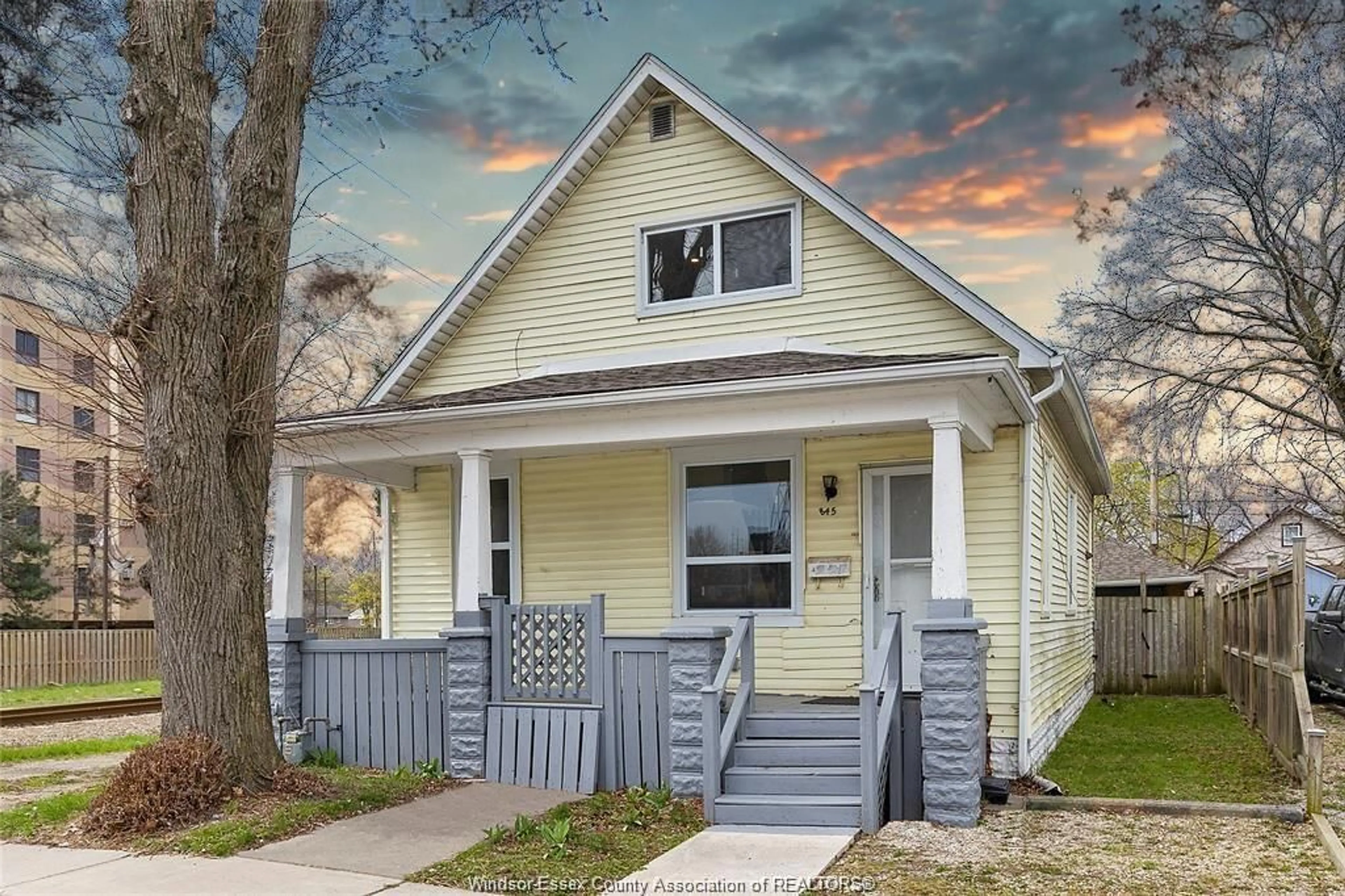 Home with vinyl exterior material, street for 845 BRIDGE Ave, Windsor Ontario N9B 2M7