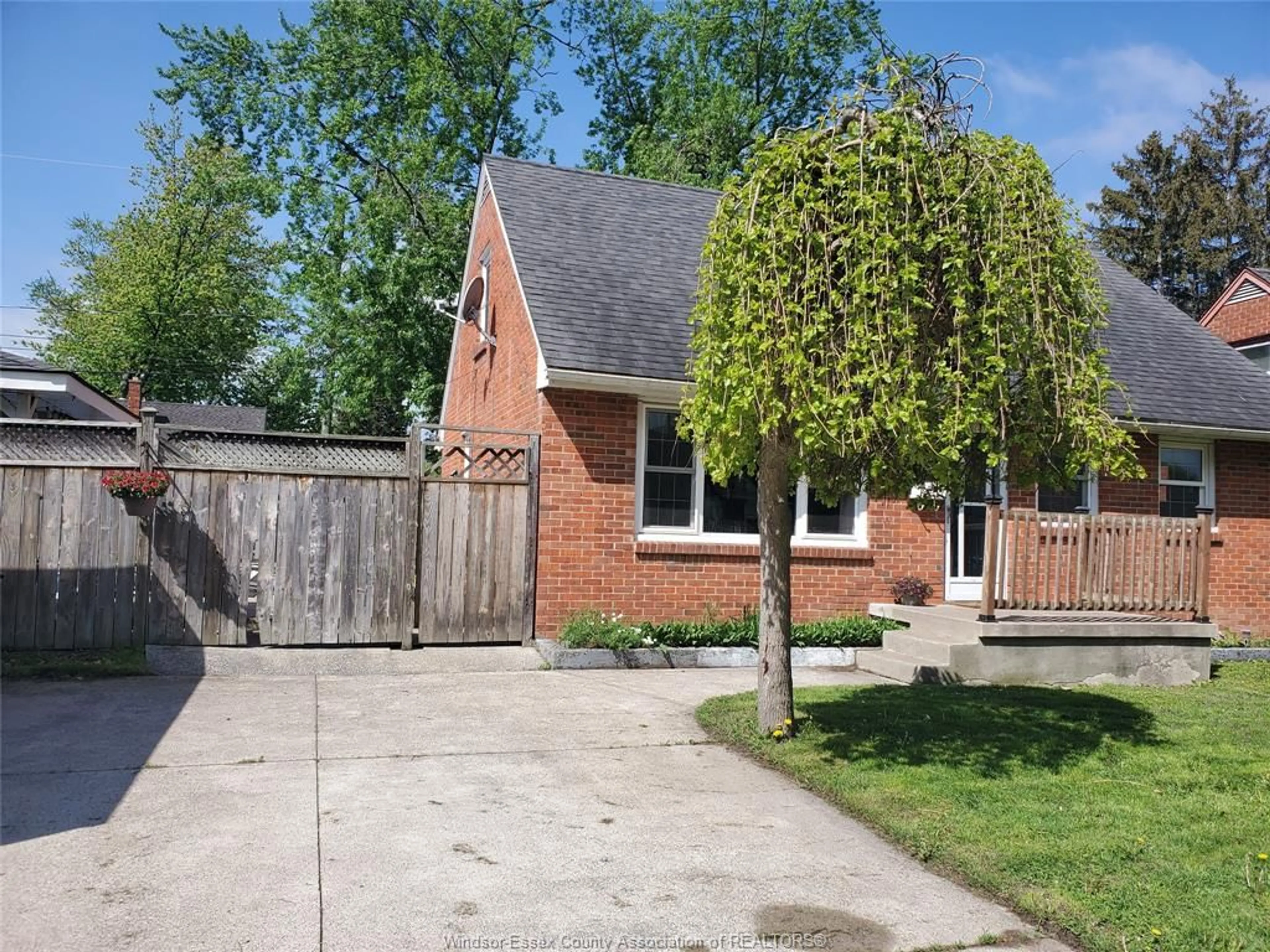 Home with brick exterior material, street for 1147 REEDMERE, Windsor Ontario N8R 2M2