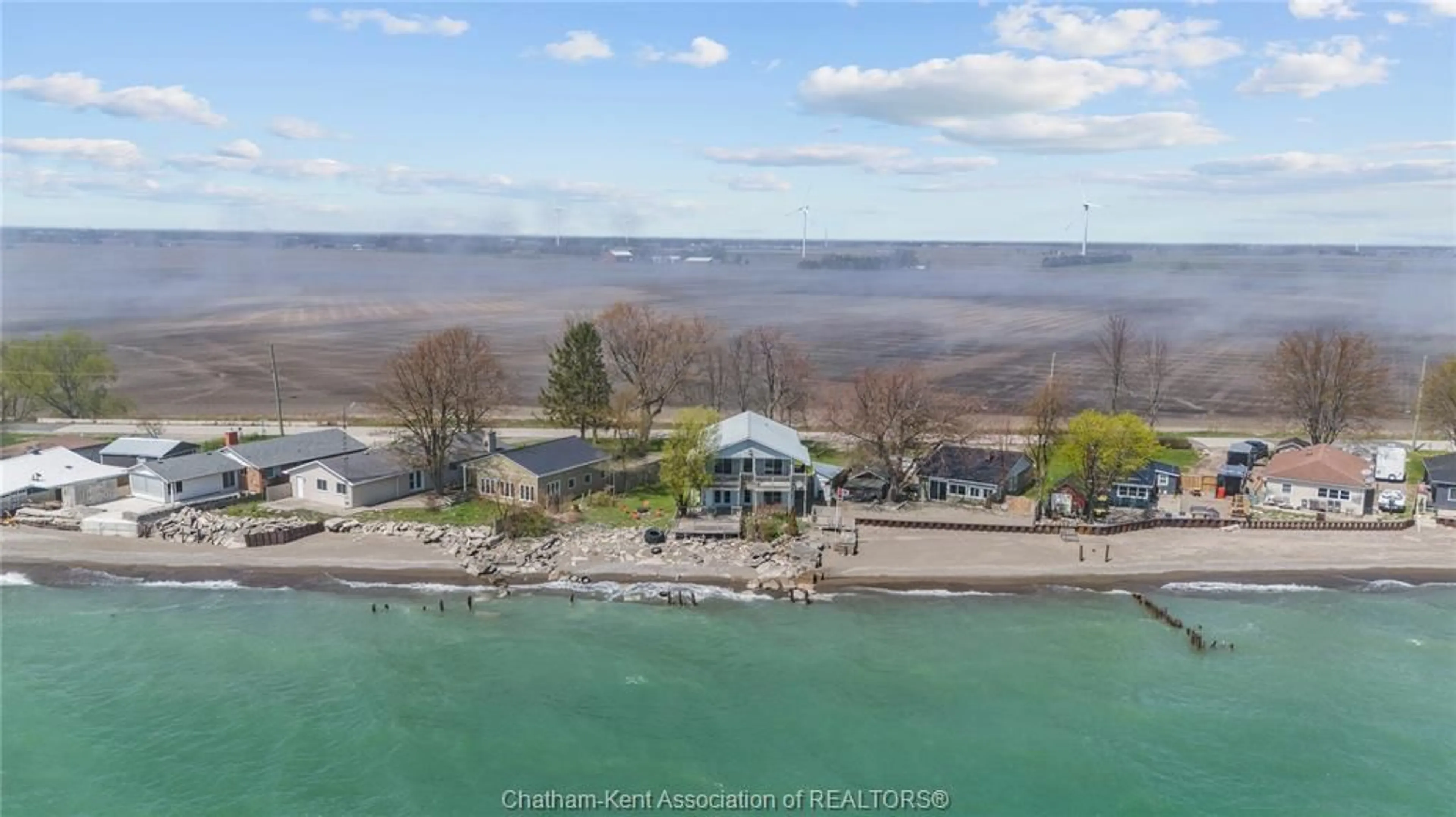 A pic from outside/outdoor area/front of a property/back of a property/a pic from drone, water/lake/river/ocean view for 18232 Erie Shore Dr, Blenheim Ontario N0P 1N0