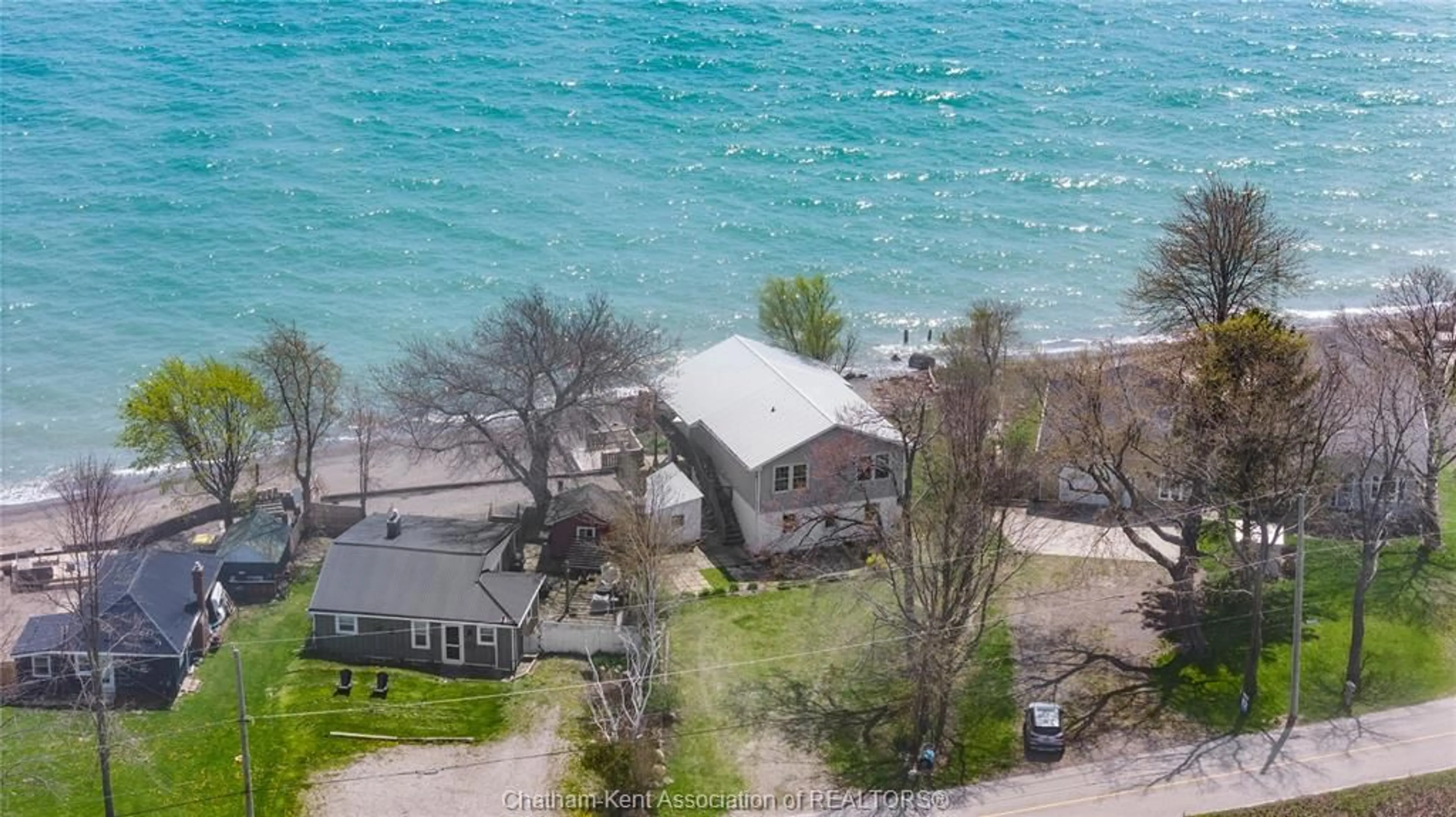A pic from outside/outdoor area/front of a property/back of a property/a pic from drone, water/lake/river/ocean view for 18232 Erie Shore Dr, Blenheim Ontario N0P 1N0