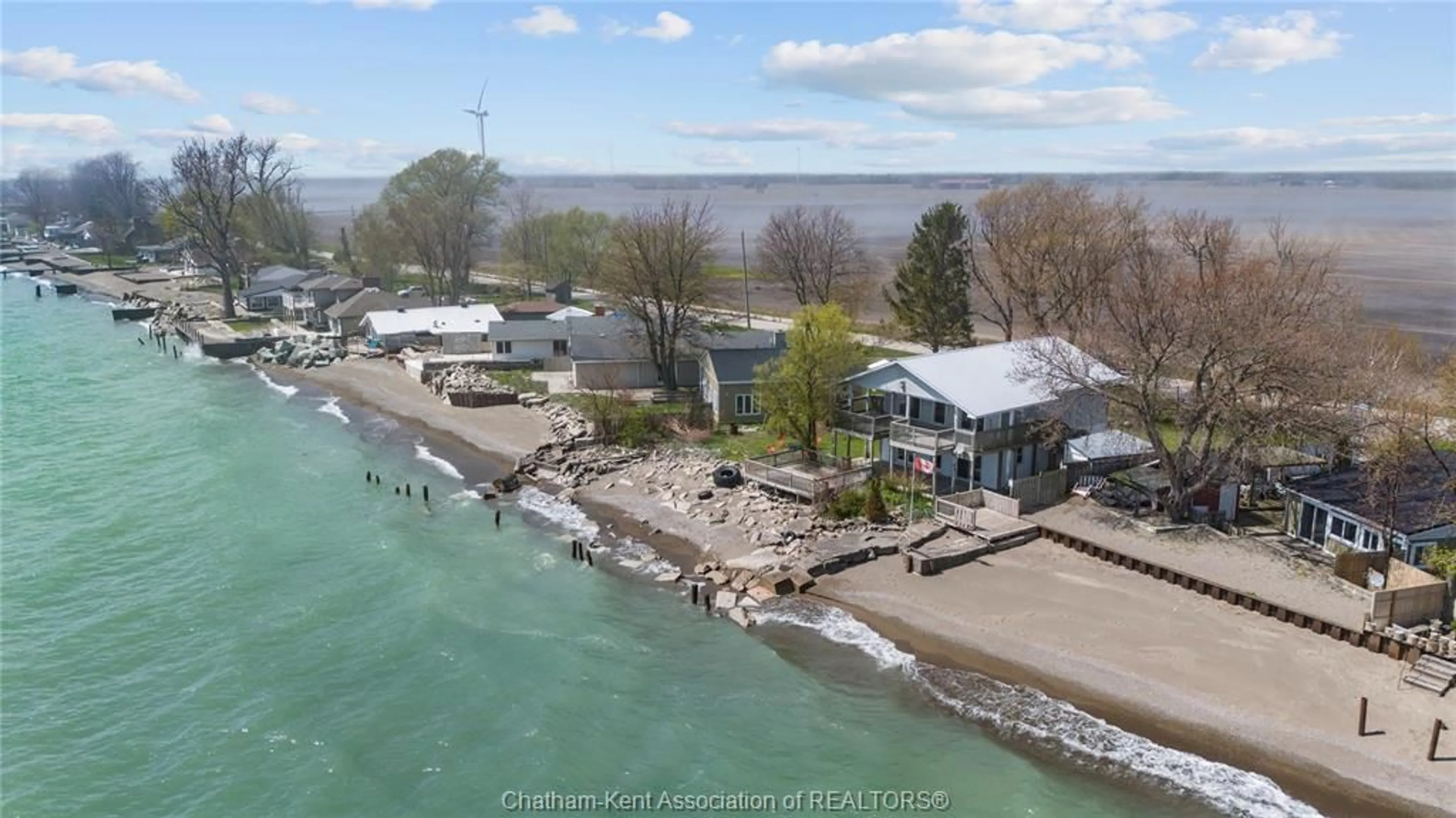 A pic from outside/outdoor area/front of a property/back of a property/a pic from drone, water/lake/river/ocean view for 18232 Erie Shore Dr, Blenheim Ontario N0P 1N0