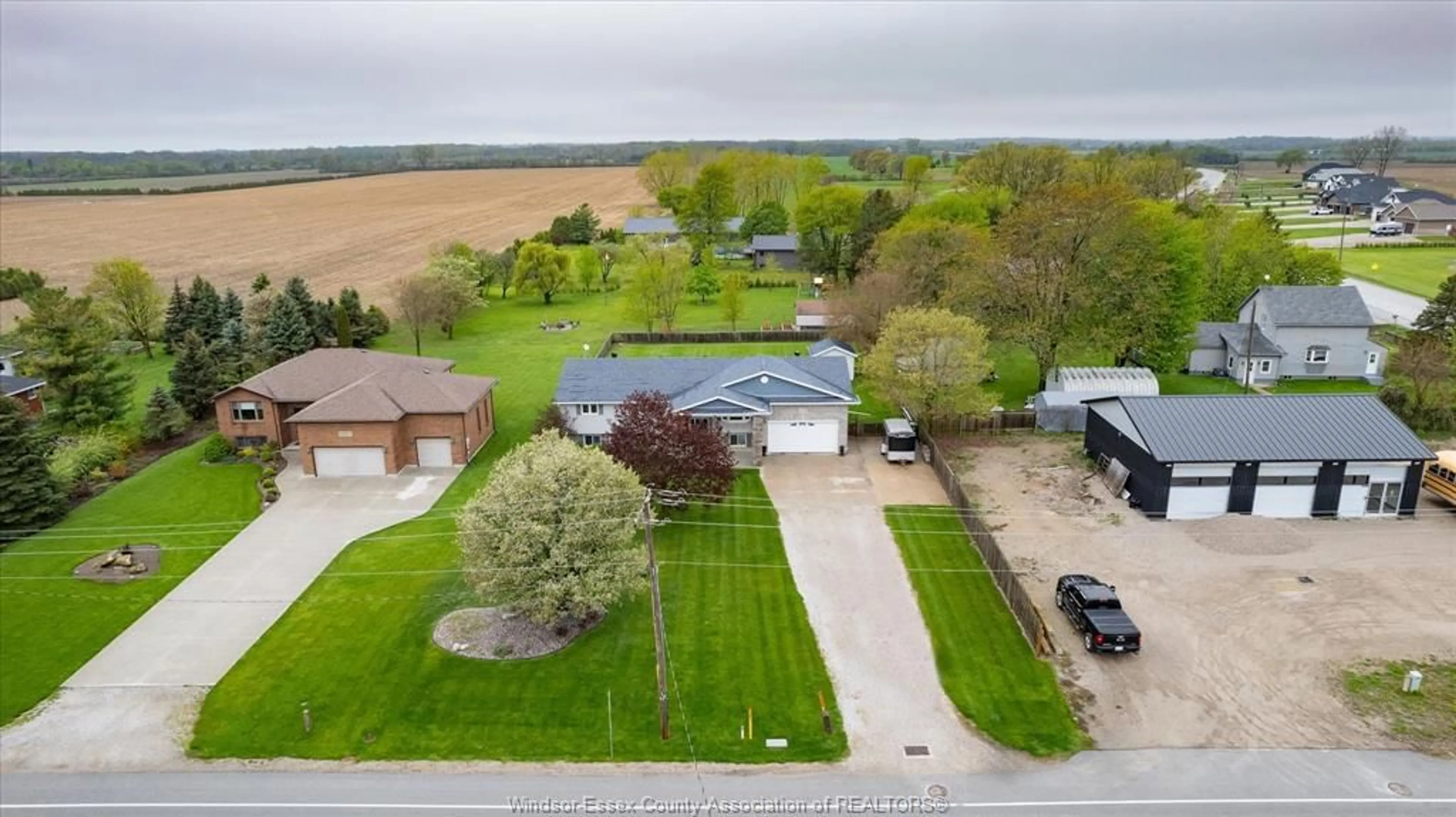 A pic from outside/outdoor area/front of a property/back of a property/a pic from drone, water/lake/river/ocean view for 6758 COUNTY RD 50, Amherstburg Ontario N0R 1G0
