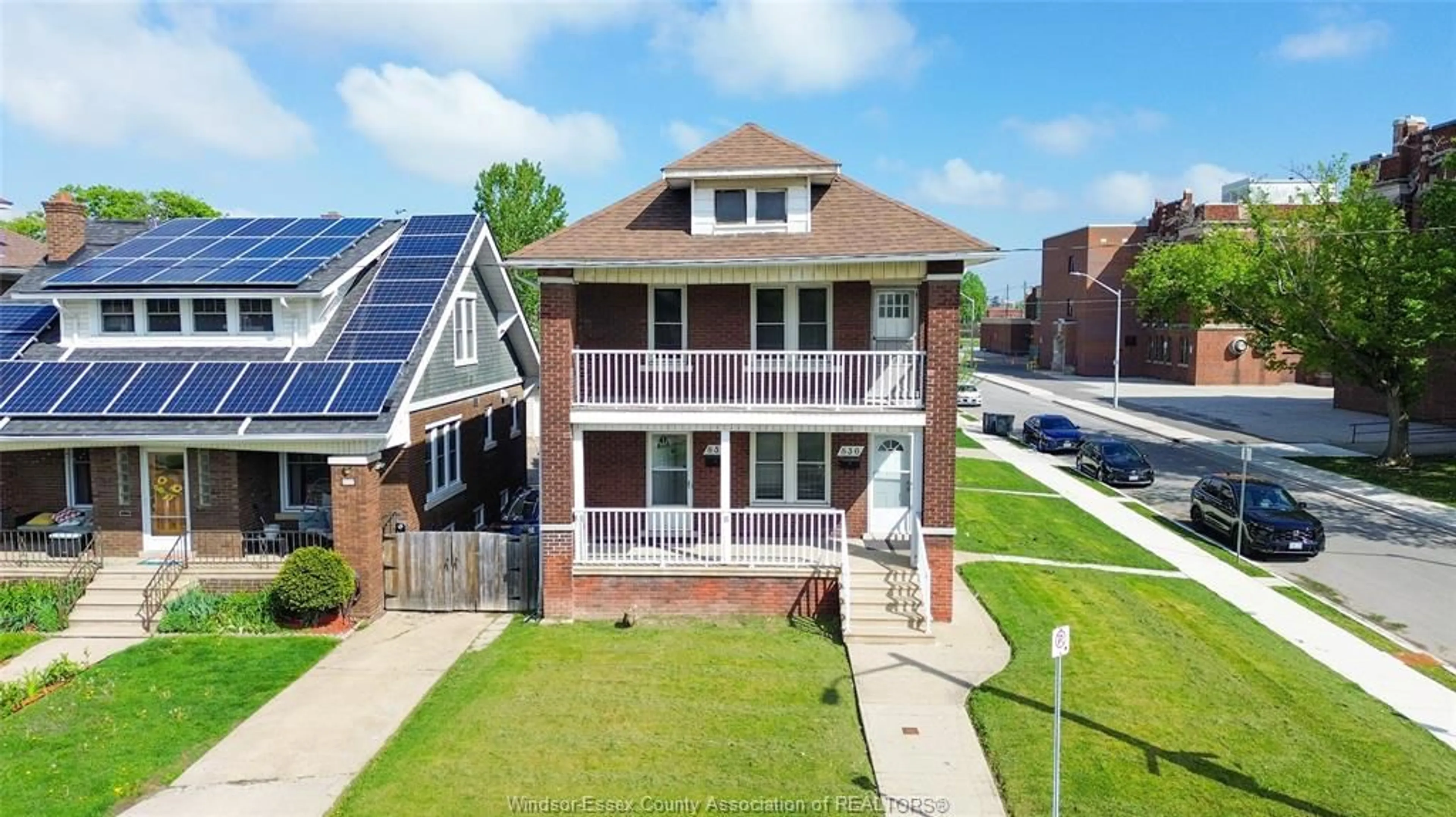 A pic from outside/outdoor area/front of a property/back of a property/a pic from drone, street for 834-836 GILES BLVD E, Windsor Ontario N9A 4E6