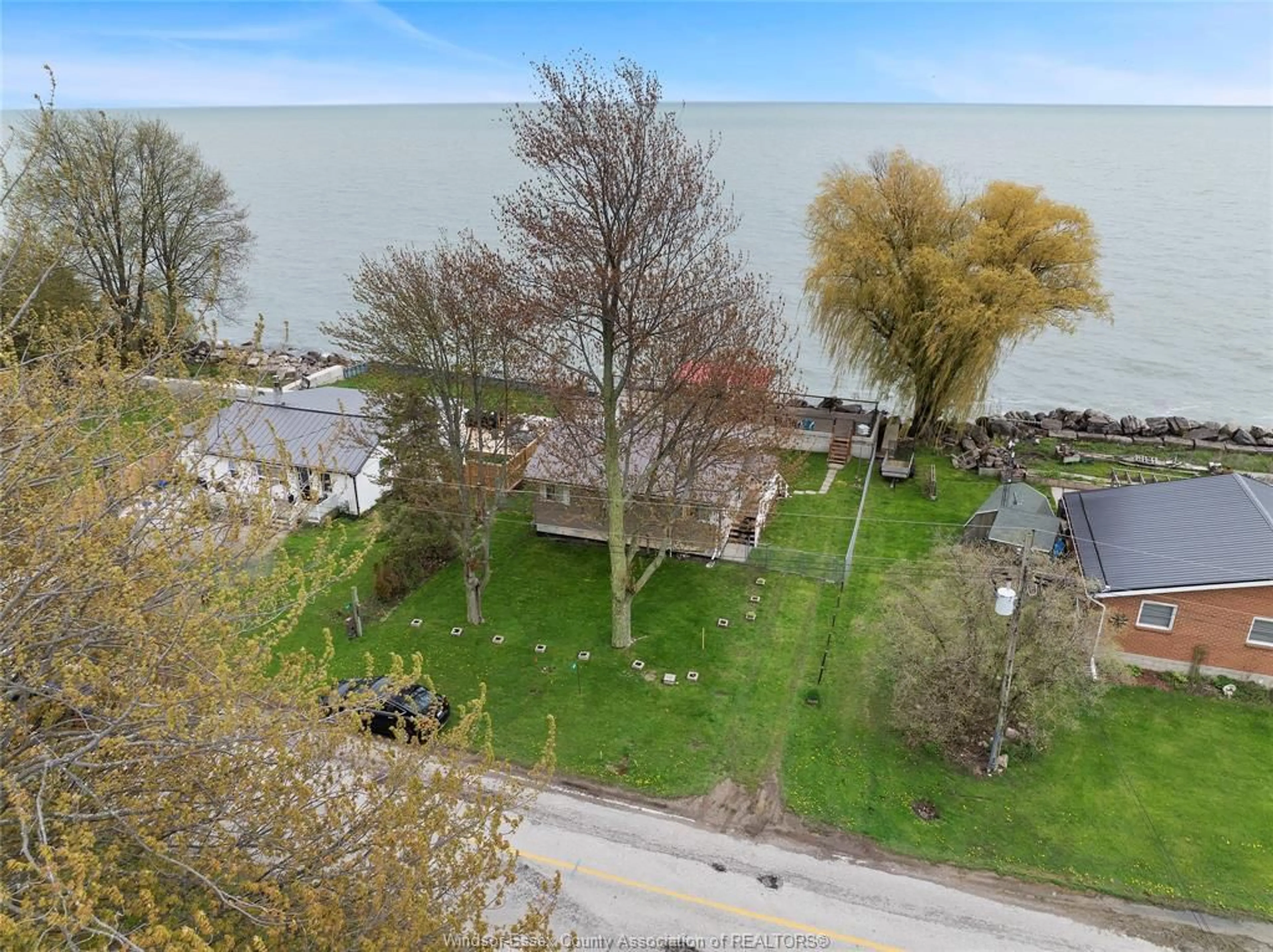 A pic from outside/outdoor area/front of a property/back of a property/a pic from drone, water/lake/river/ocean view for 156 LAKESHORE, Leamington Ontario N0P 2P0