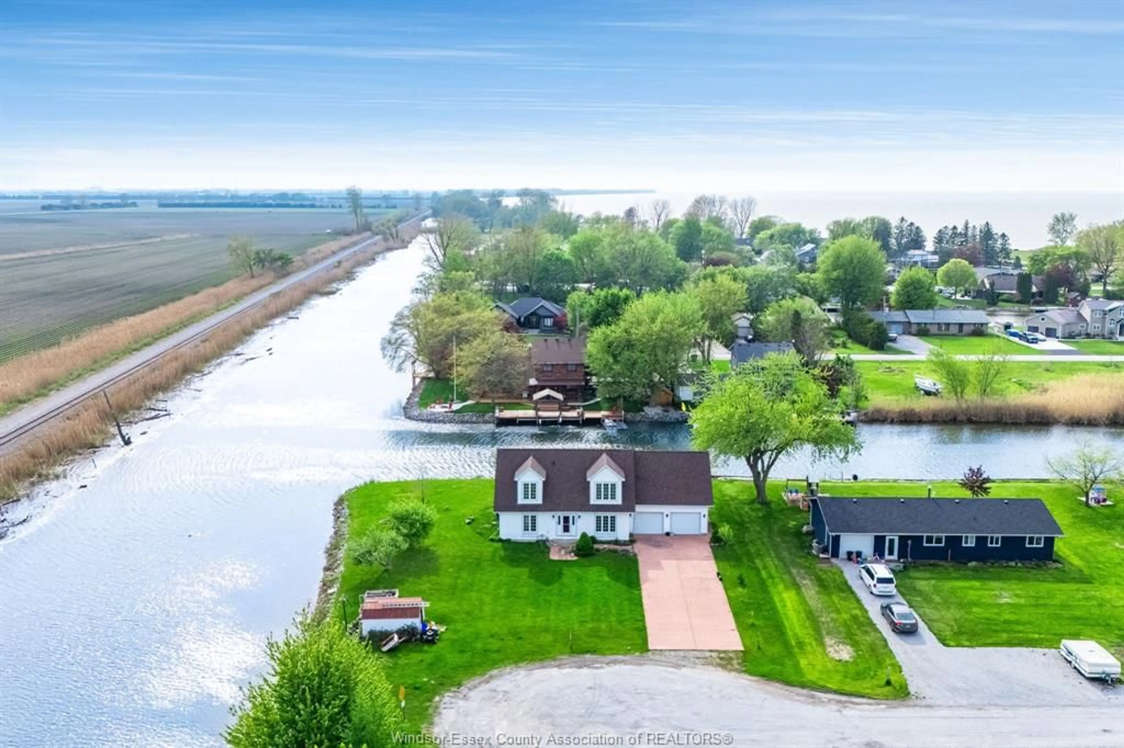 A pic from outside/outdoor area/front of a property/back of a property/a pic from drone, water/lake/river/ocean view for 935 Rivait Drive, Lighthouse Cove Ontario N0P 2L0