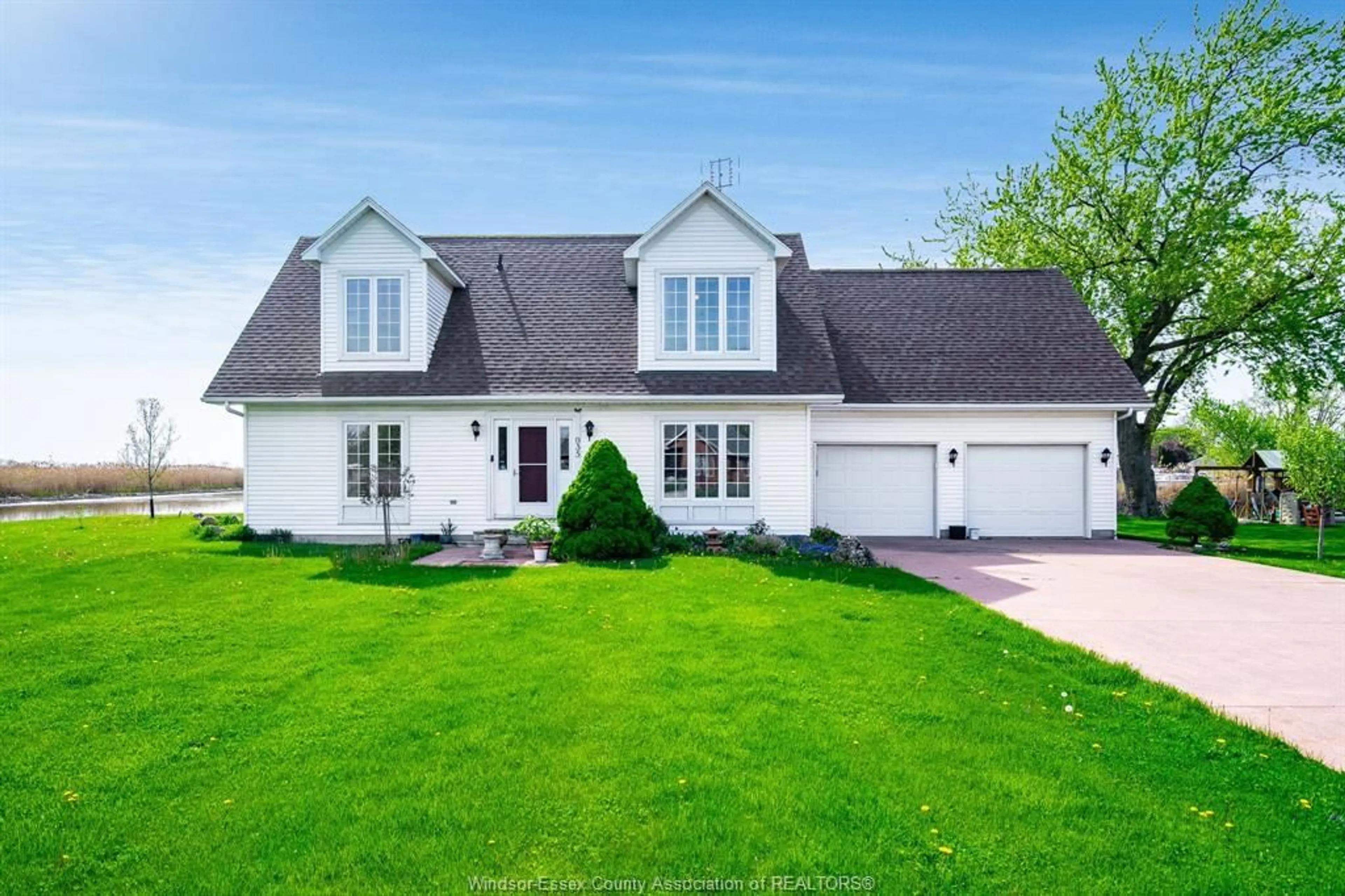 Home with vinyl exterior material, street for 935 Rivait Drive, Lighthouse Cove Ontario N0P 2L0
