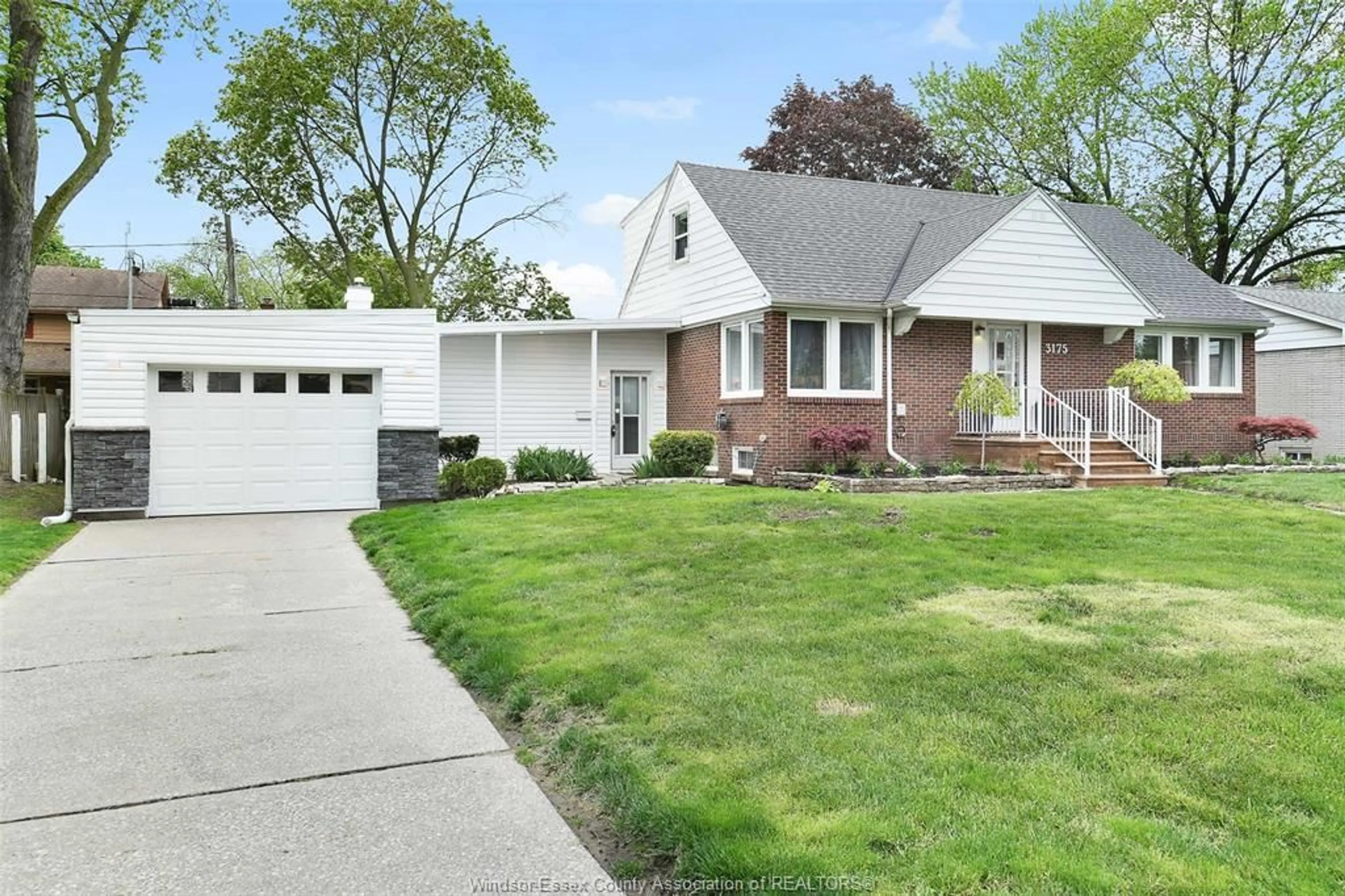 Home with brick exterior material, street for 3175 Randolph Ave, Windsor Ontario N9E 3E5