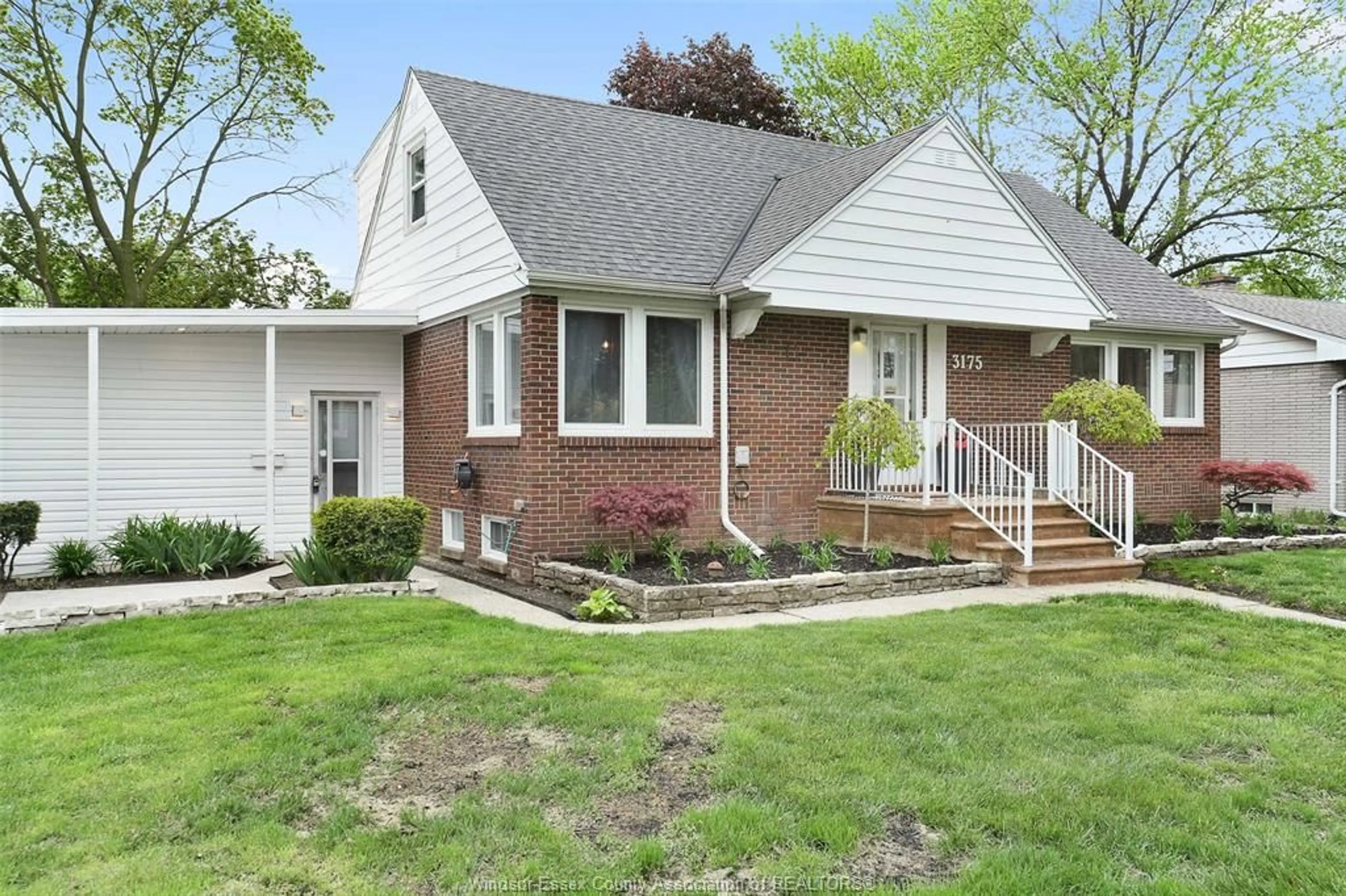Home with brick exterior material, street for 3175 Randolph Ave, Windsor Ontario N9E 3E5