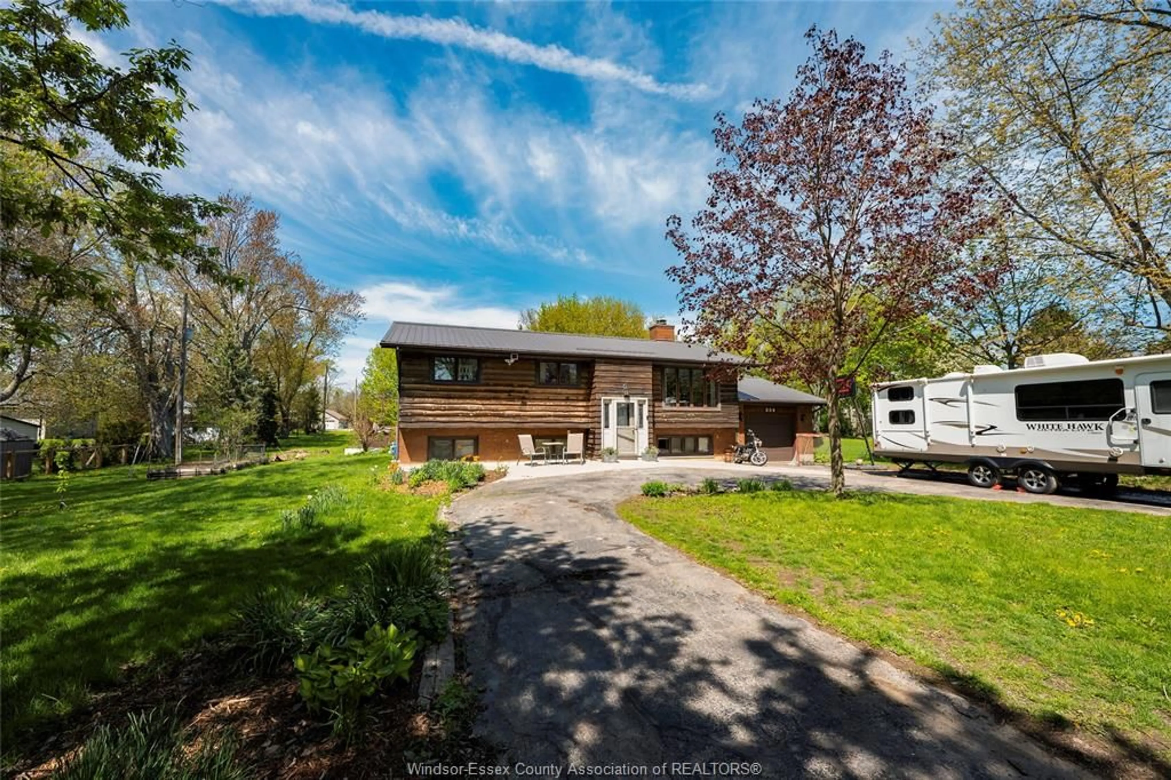 A pic from outside/outdoor area/front of a property/back of a property/a pic from drone, street for 224 Chester Rd, Colchester Ontario N0R 1G0