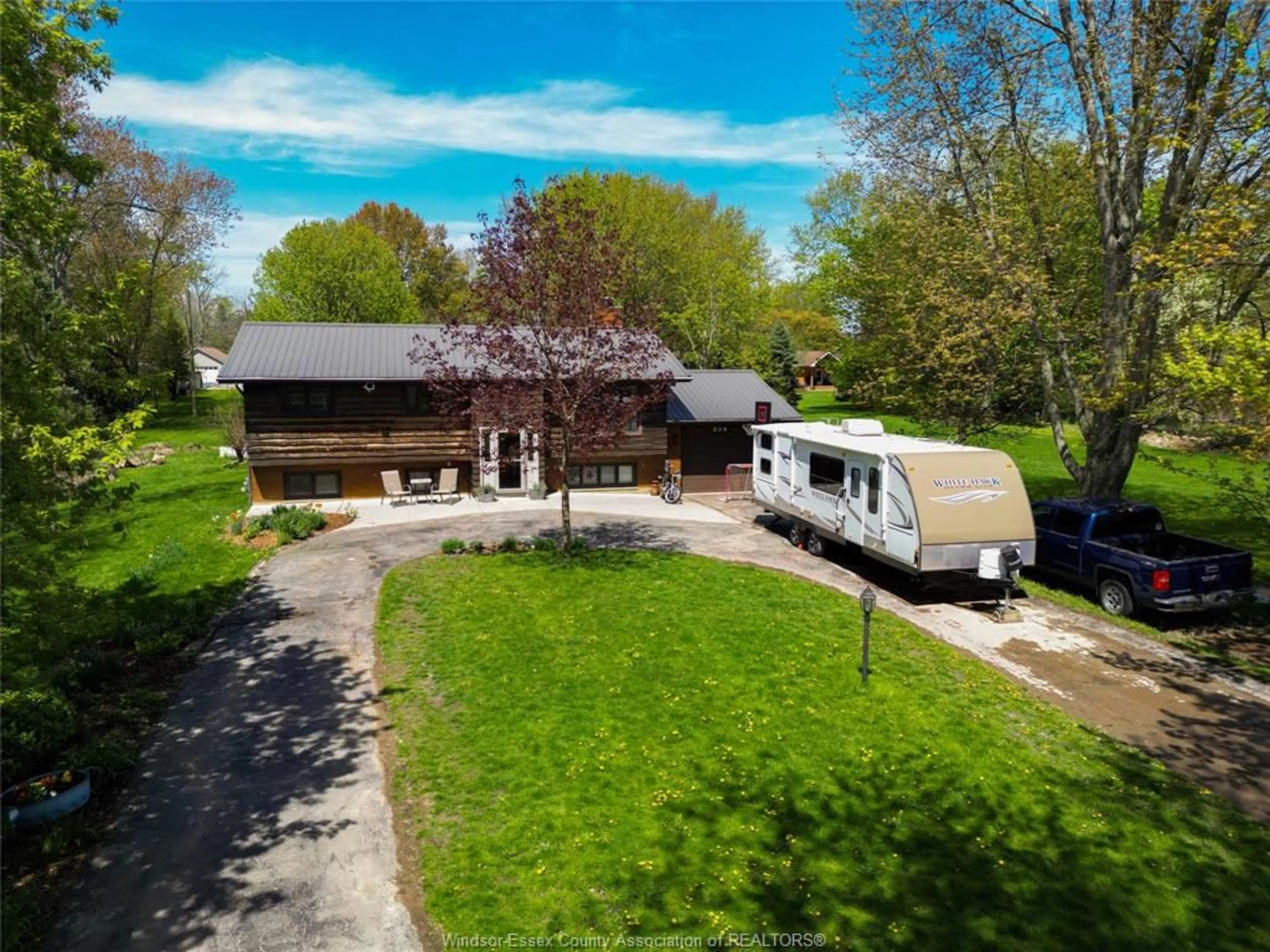 A pic from outside/outdoor area/front of a property/back of a property/a pic from drone, street for 224 Chester Rd, Colchester Ontario N0R 1G0