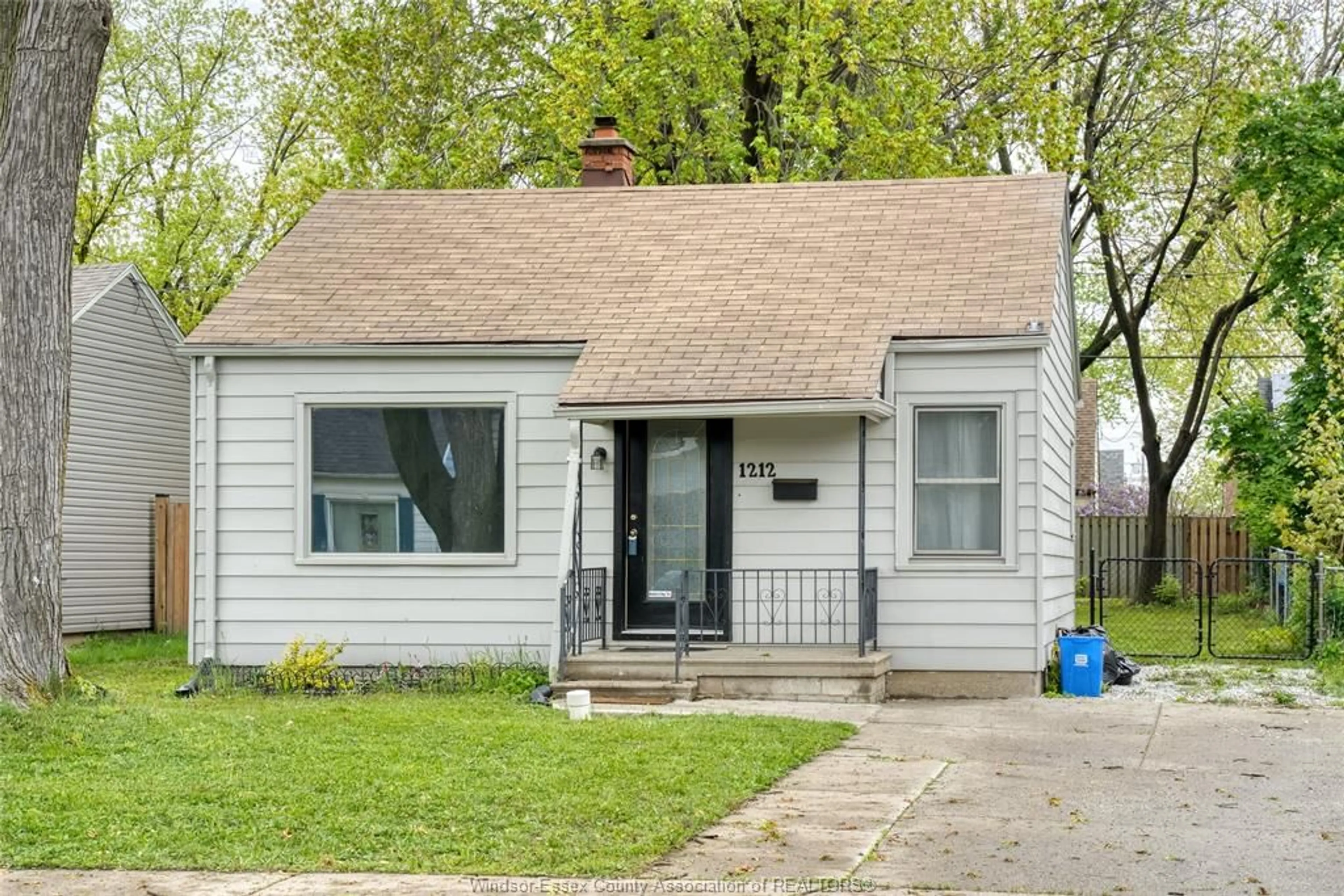 Home with vinyl exterior material, street for 1212 Elm Ave, Windsor Ontario N8X 2B5