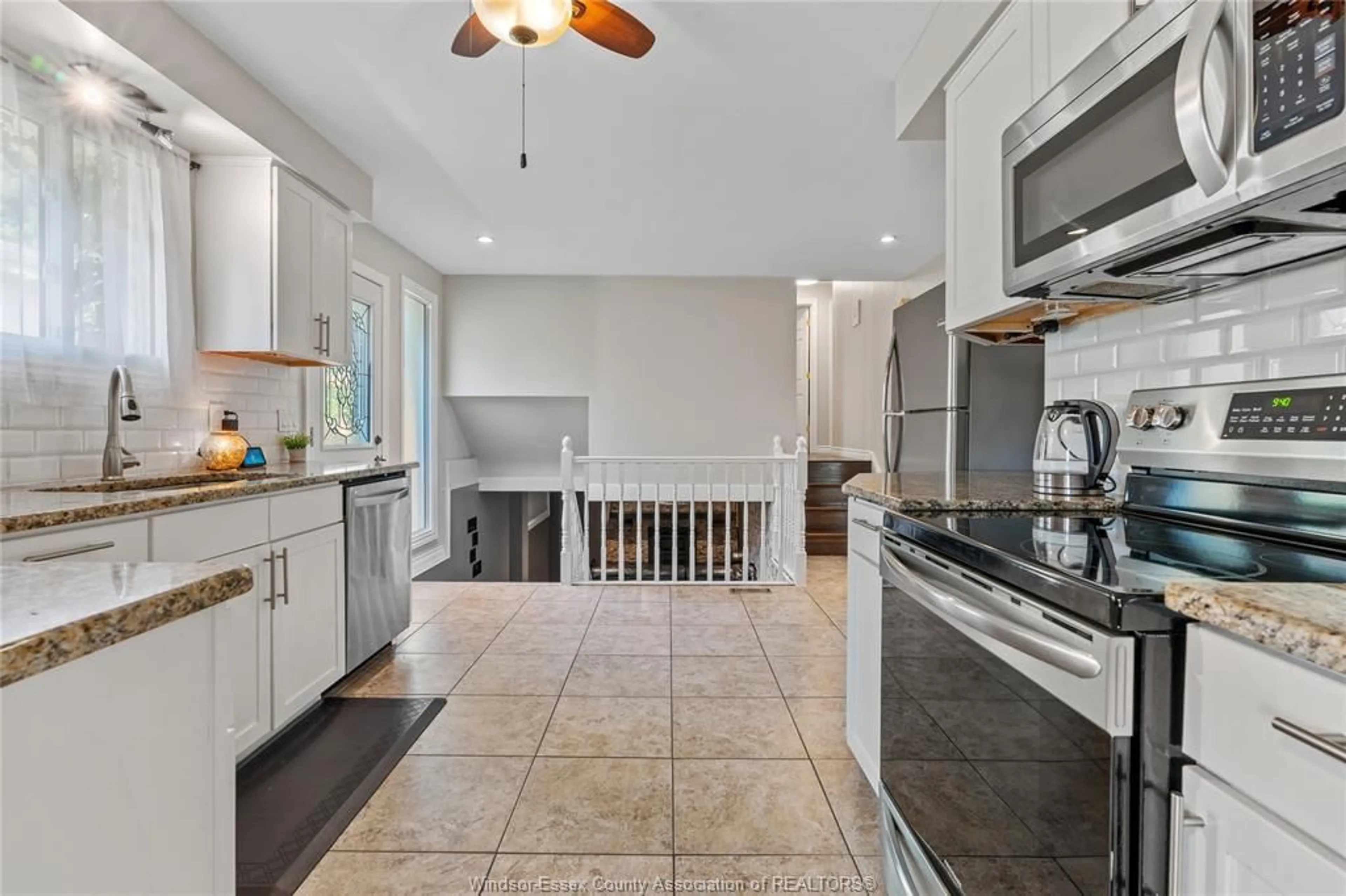 Open concept kitchen, ceramic/tile floor for 3073 WILDWOOD Dr, Windsor Ontario N8R 1S7