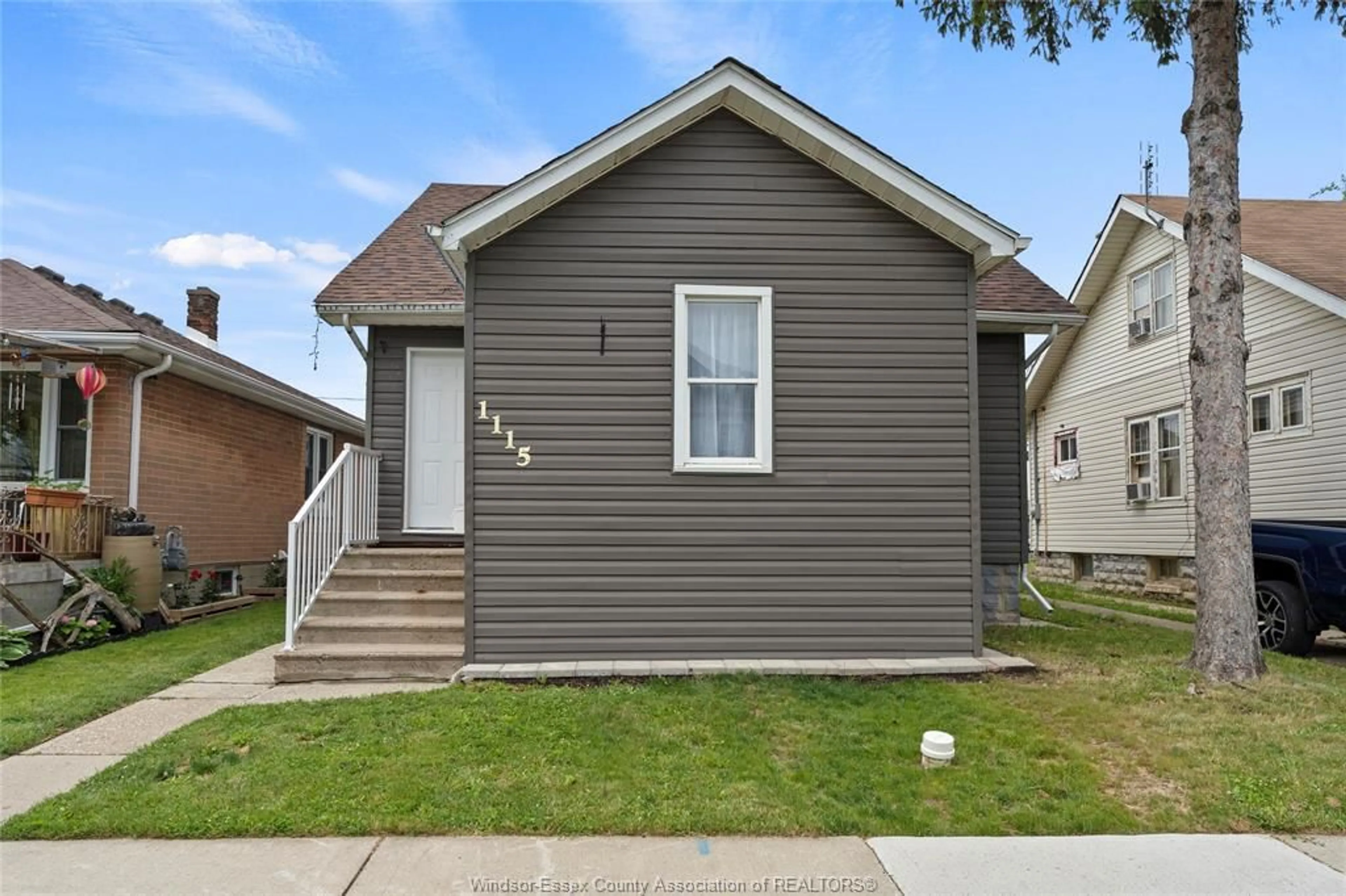 Home with vinyl exterior material, street for 1115 HIGHLAND Ave, Windsor Ontario N9A 1R6