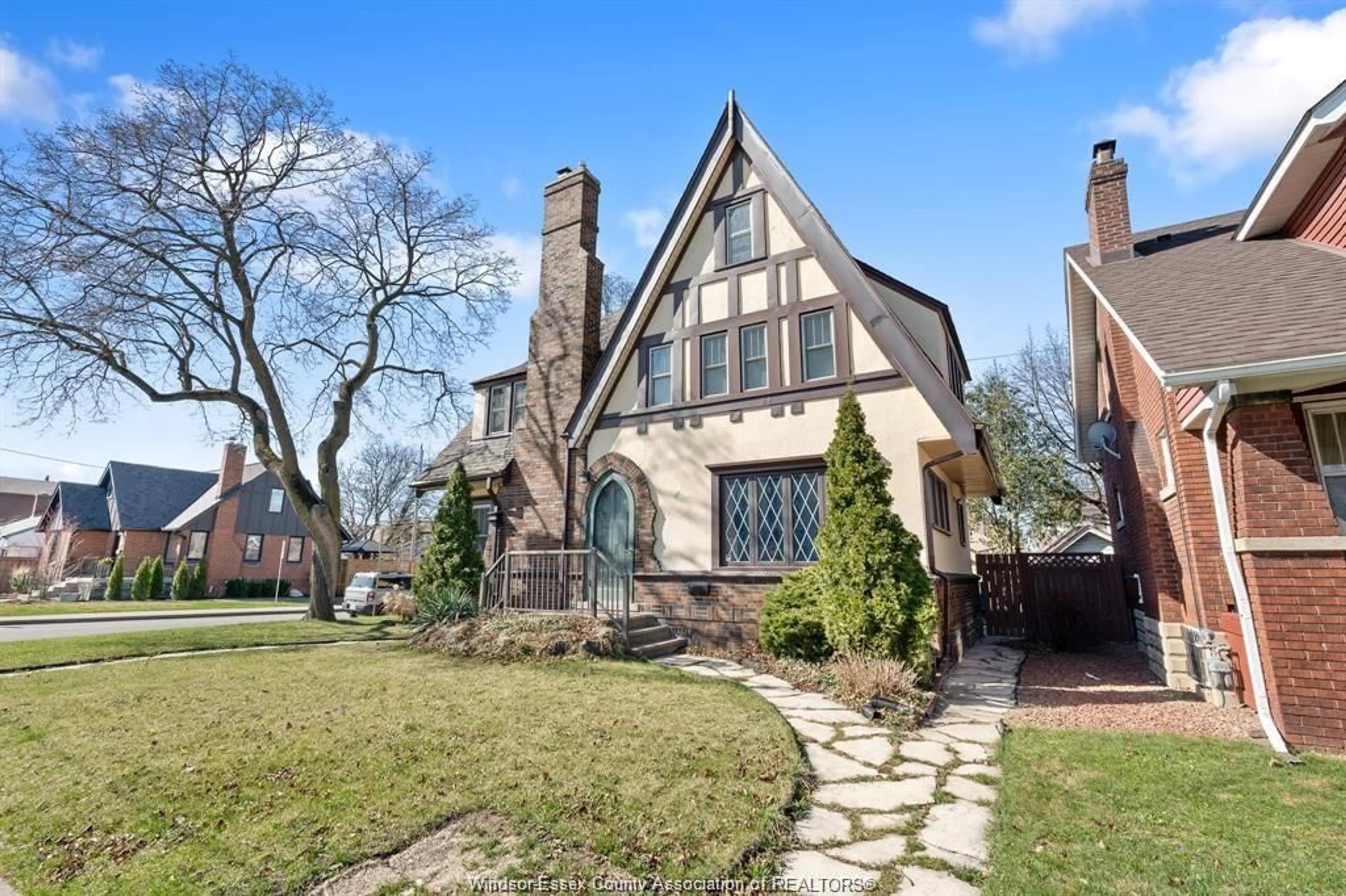 Home with brick exterior material, street for 2195 KILDARE, Windsor Ontario N8W 2W9