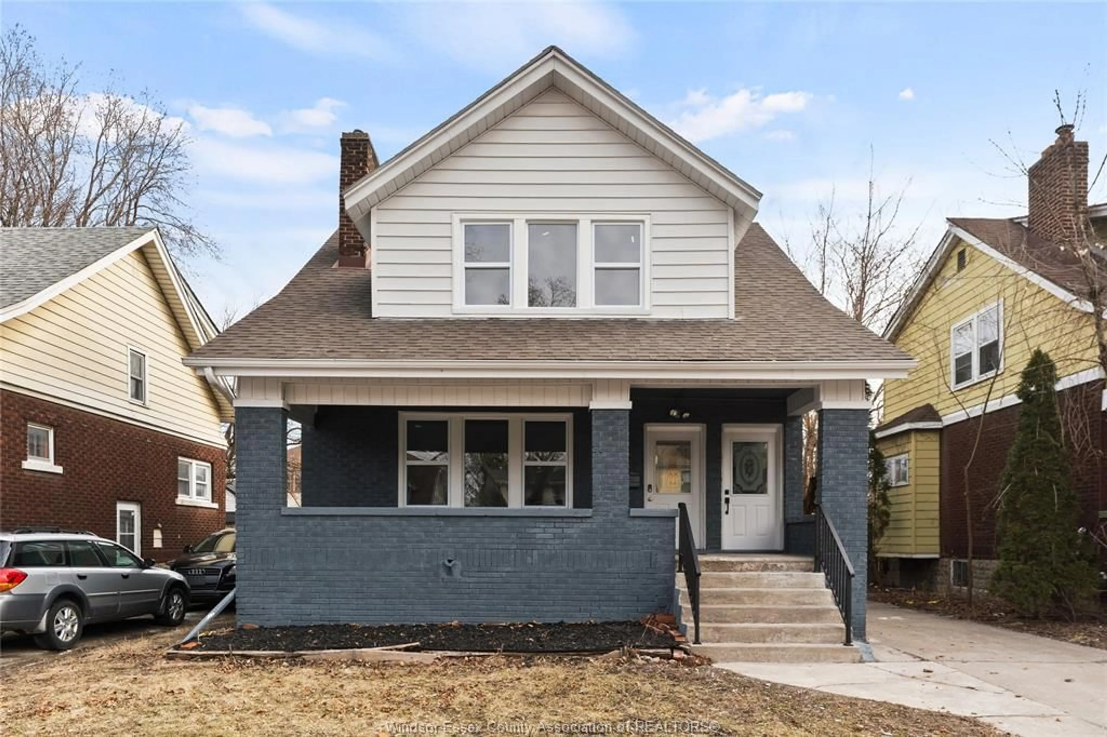 Home with brick exterior material, street for 406 PARTINGTON Ave, Windsor Ontario N9B 2W5