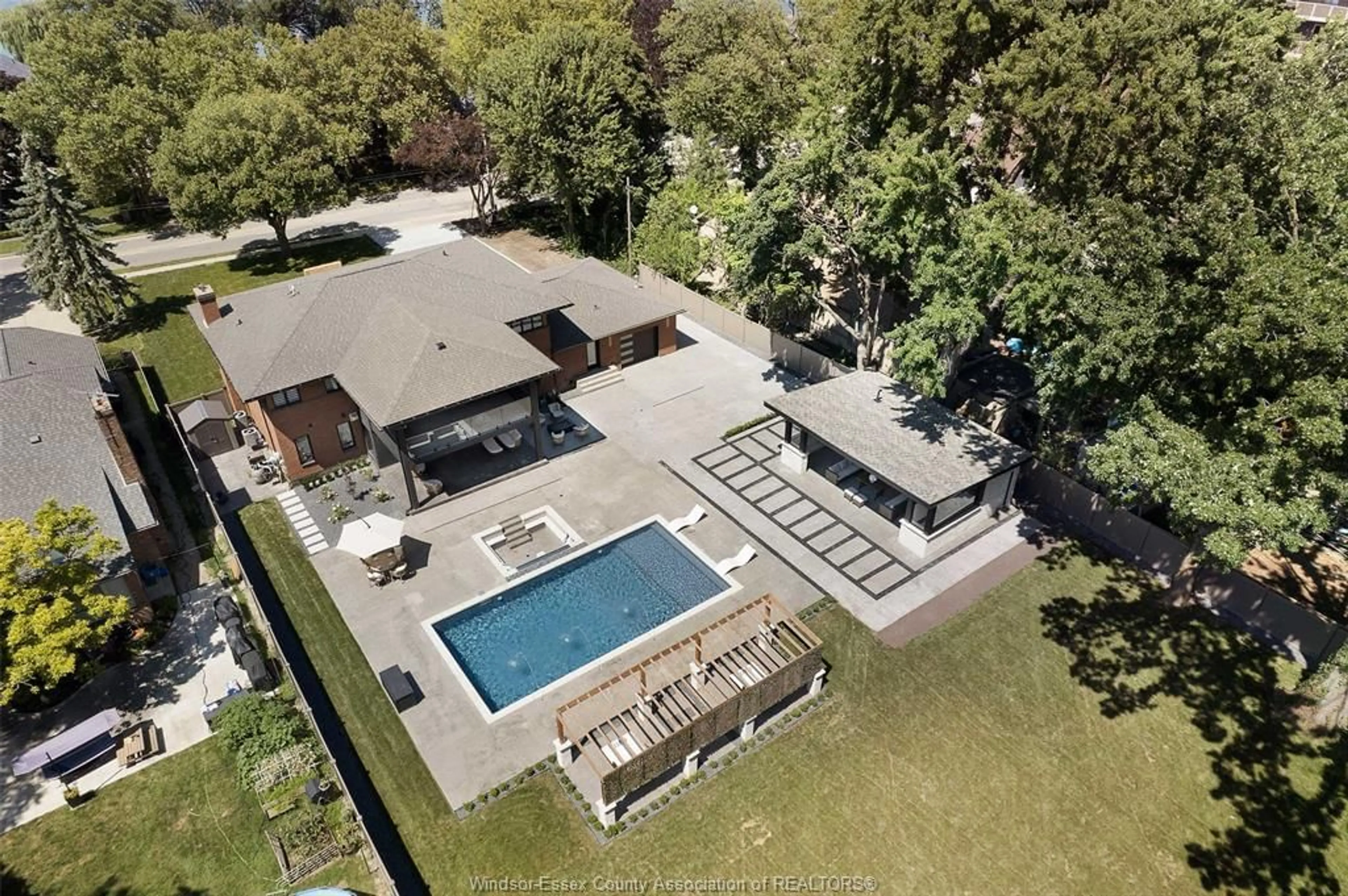 A pic from outside/outdoor area/front of a property/back of a property/a pic from drone, water/lake/river/ocean view for 4527 RIVERSIDE Dr, Windsor Ontario N8Y 1B7