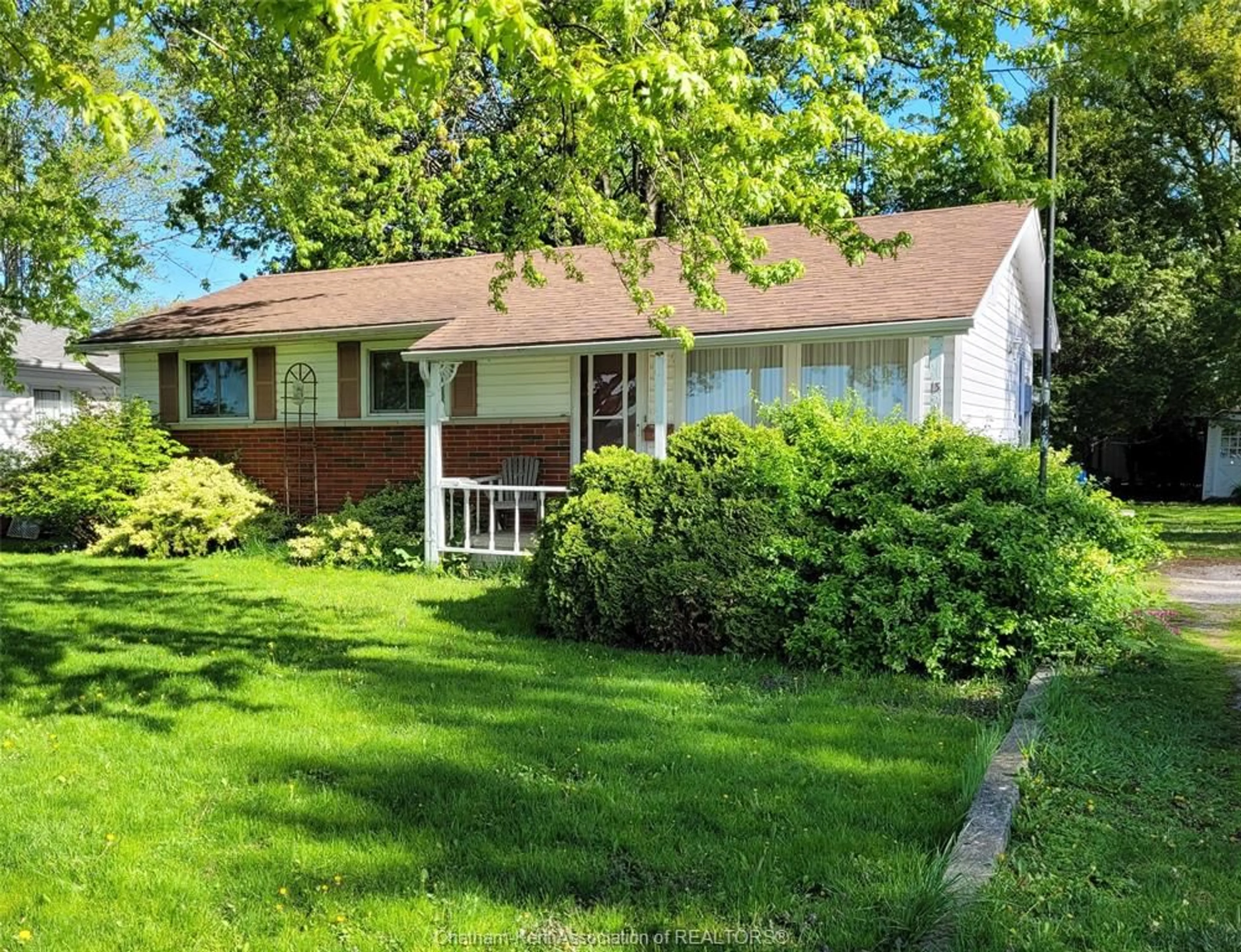 Home with vinyl exterior material, street for 13 Maple St, Wallaceburg Ontario N8A 4R9