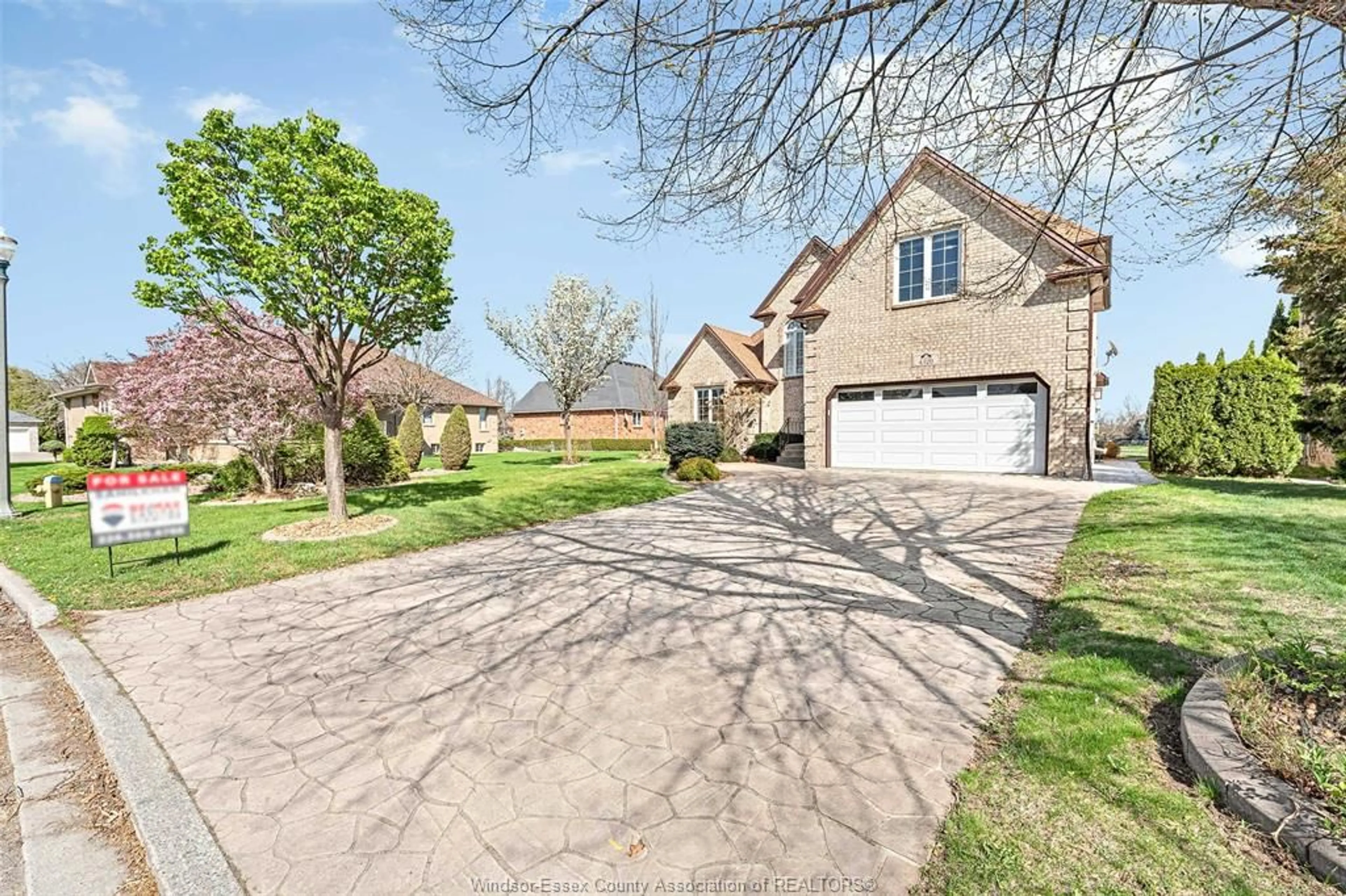 A pic from outside/outdoor area/front of a property/back of a property/a pic from drone, street for 4520 CENTRE LAKE Dr, Windsor Ontario N9G 2R1