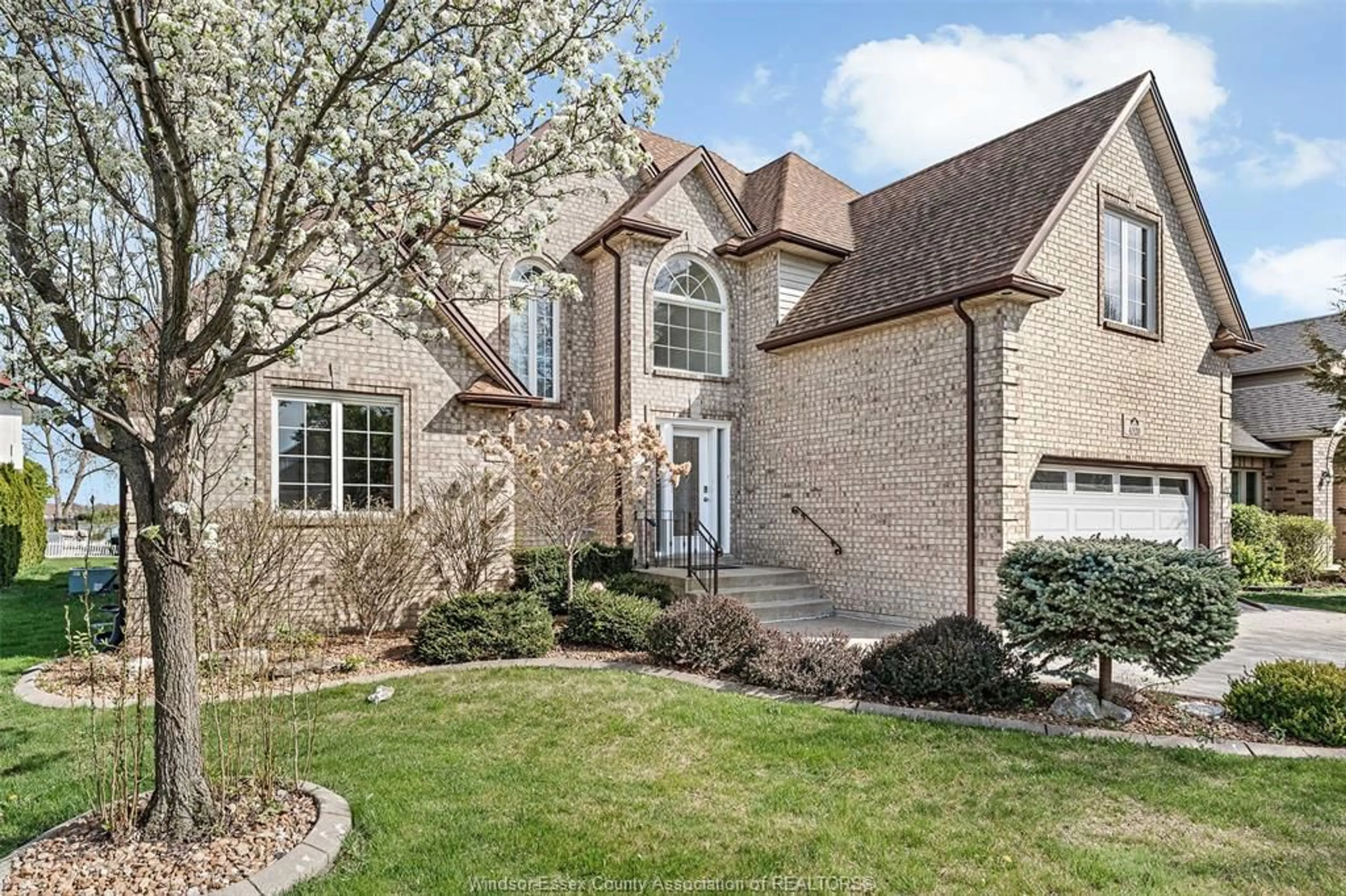 Home with brick exterior material, street for 4520 CENTRE LAKE Dr, Windsor Ontario N9G 2R1