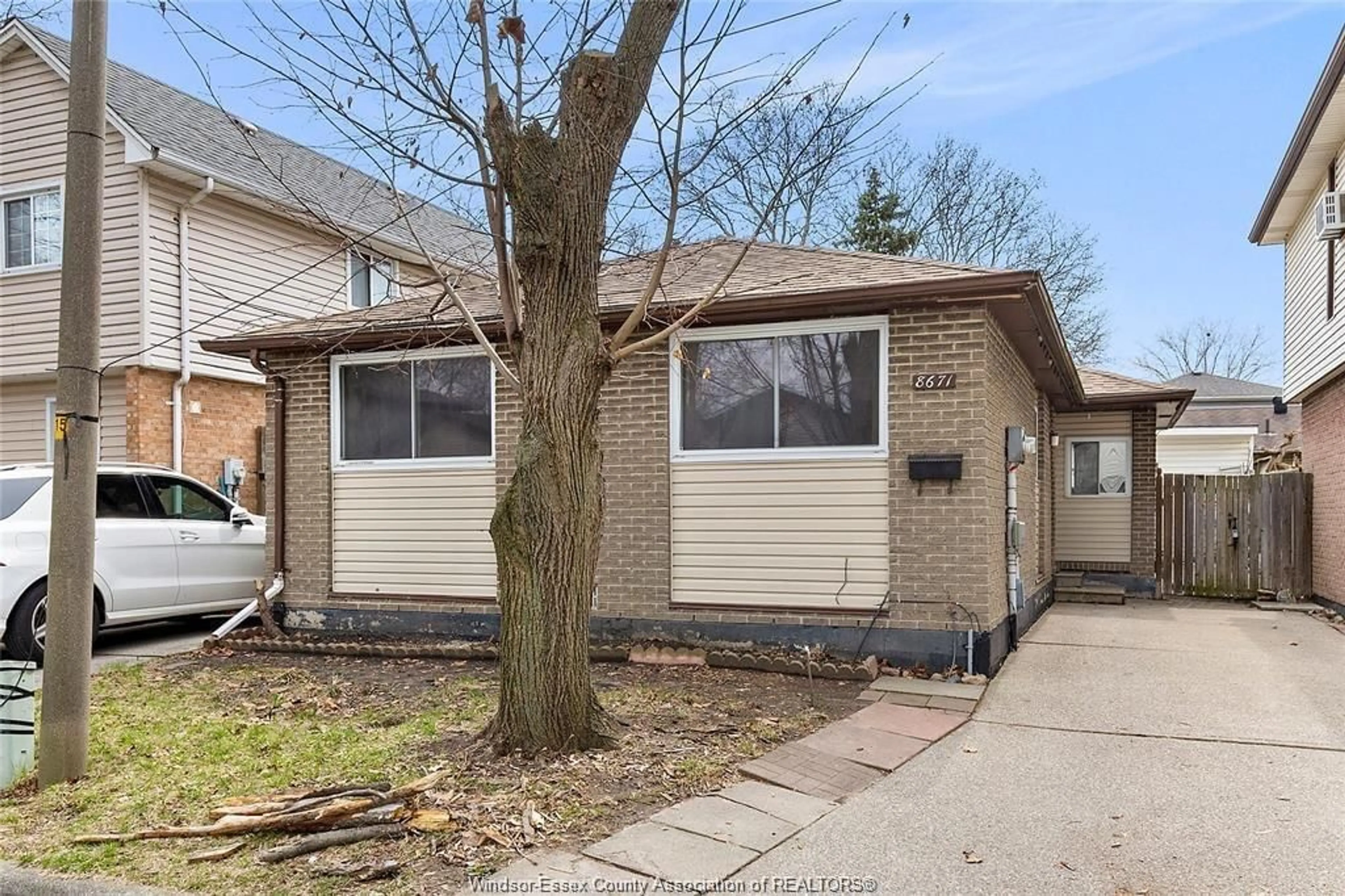 Home with vinyl exterior material, street for 8671 DARLINGTON Cres, Windsor Ontario N8S 4M2