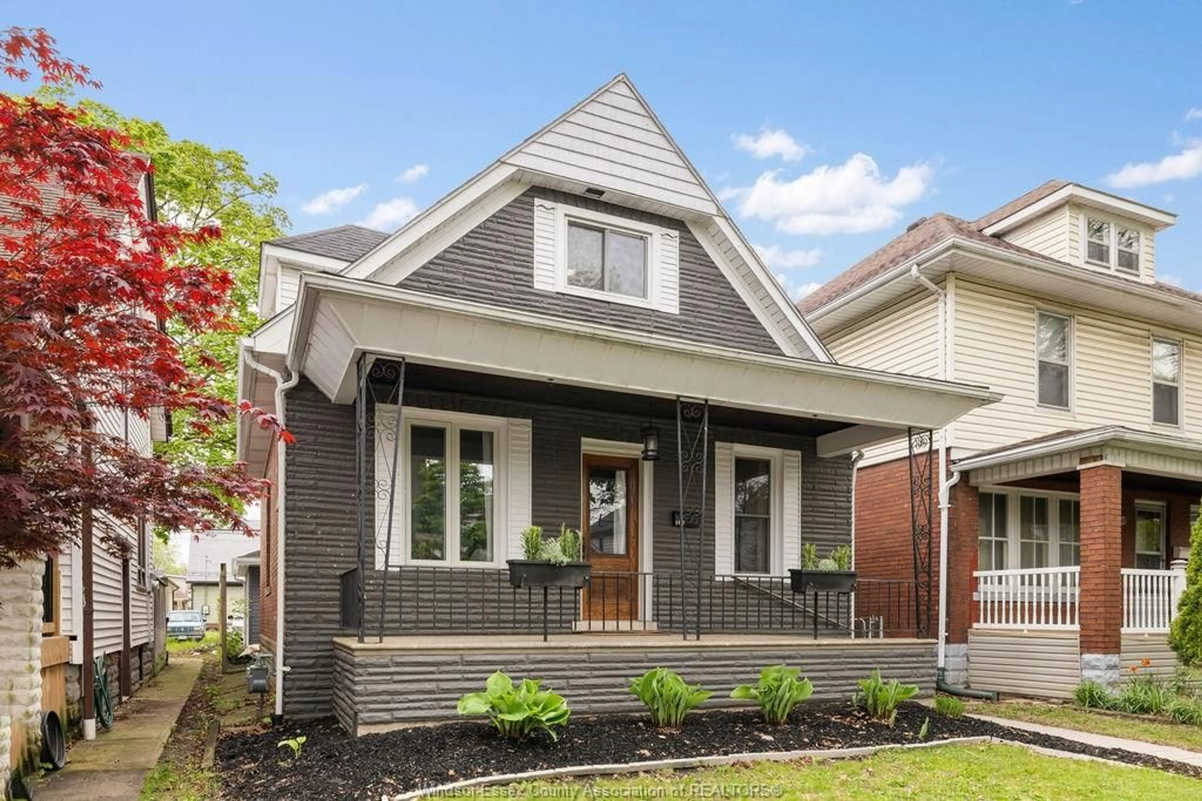 Home with brick exterior material, street for 1137 WINDERMERE Rd, Windsor Ontario N8Y 3E7
