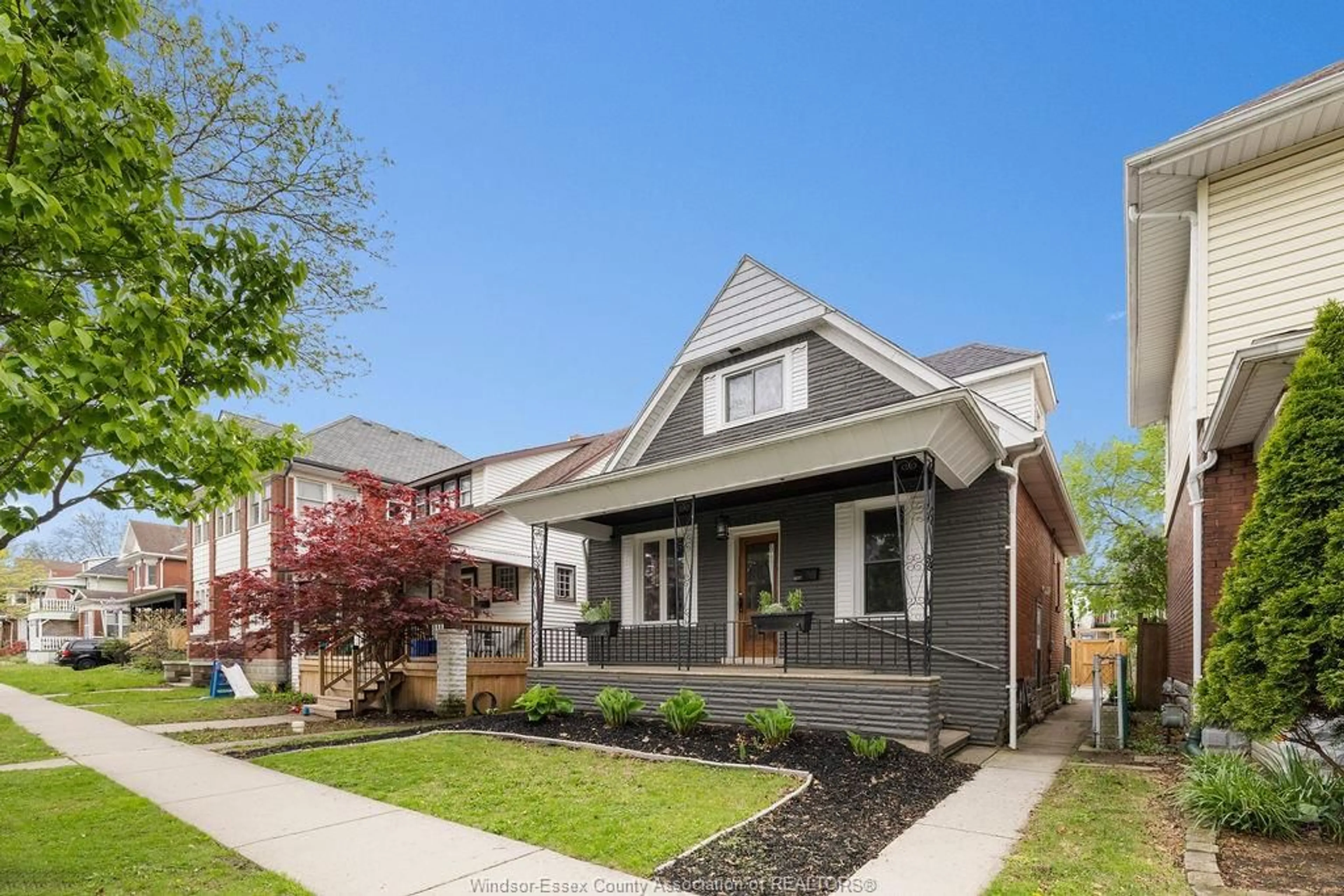 Home with brick exterior material, street for 1137 WINDERMERE Rd, Windsor Ontario N8Y 3E7