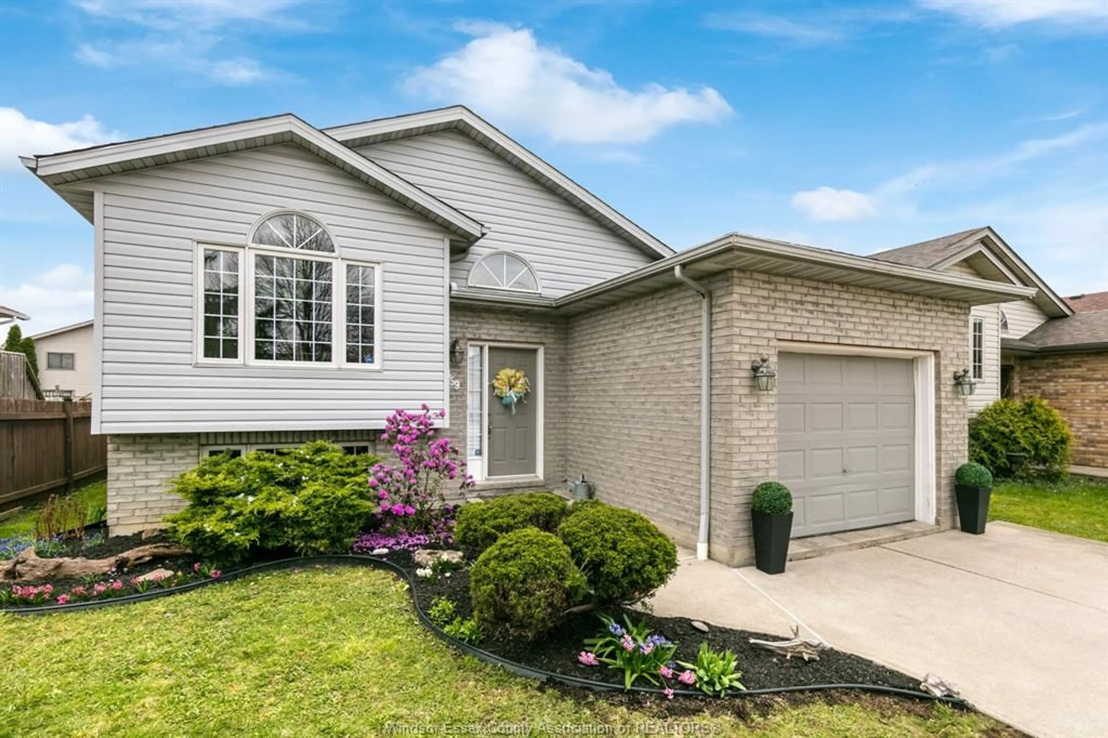 Home with vinyl exterior material, street for 1859 FULLER Cres, Windsor Ontario N8W 5S2