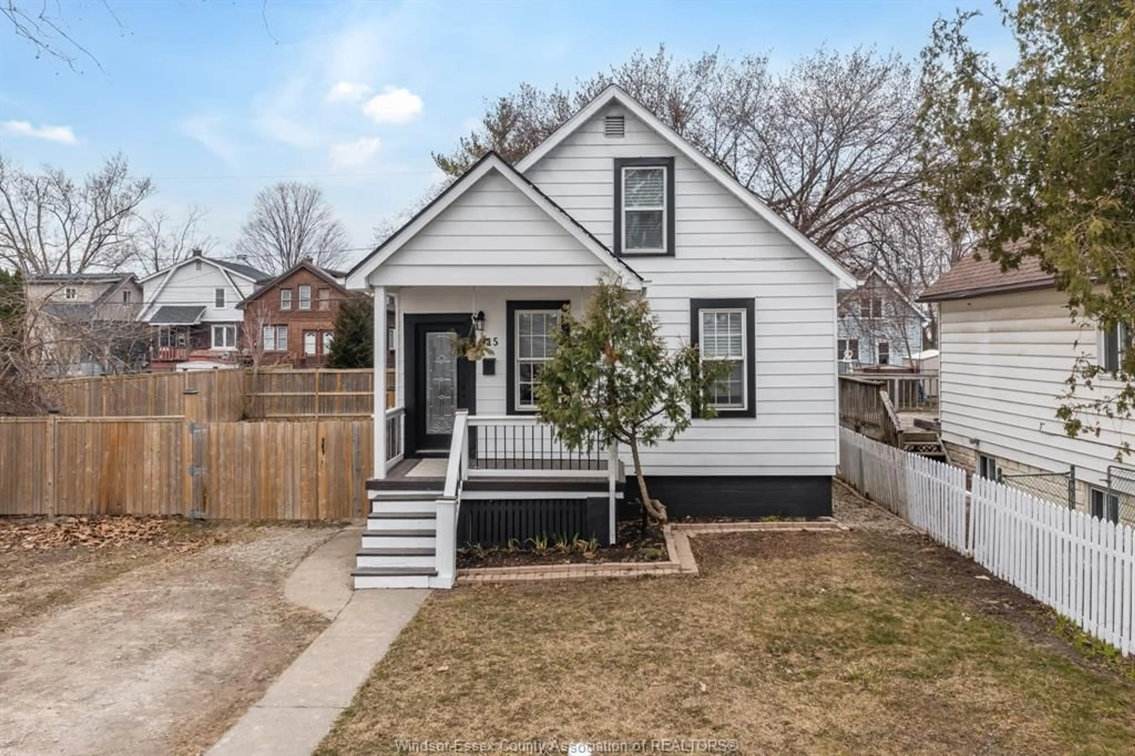 Home with vinyl exterior material, street for 915 MCKAY Ave, Windsor Ontario N9B 2A4