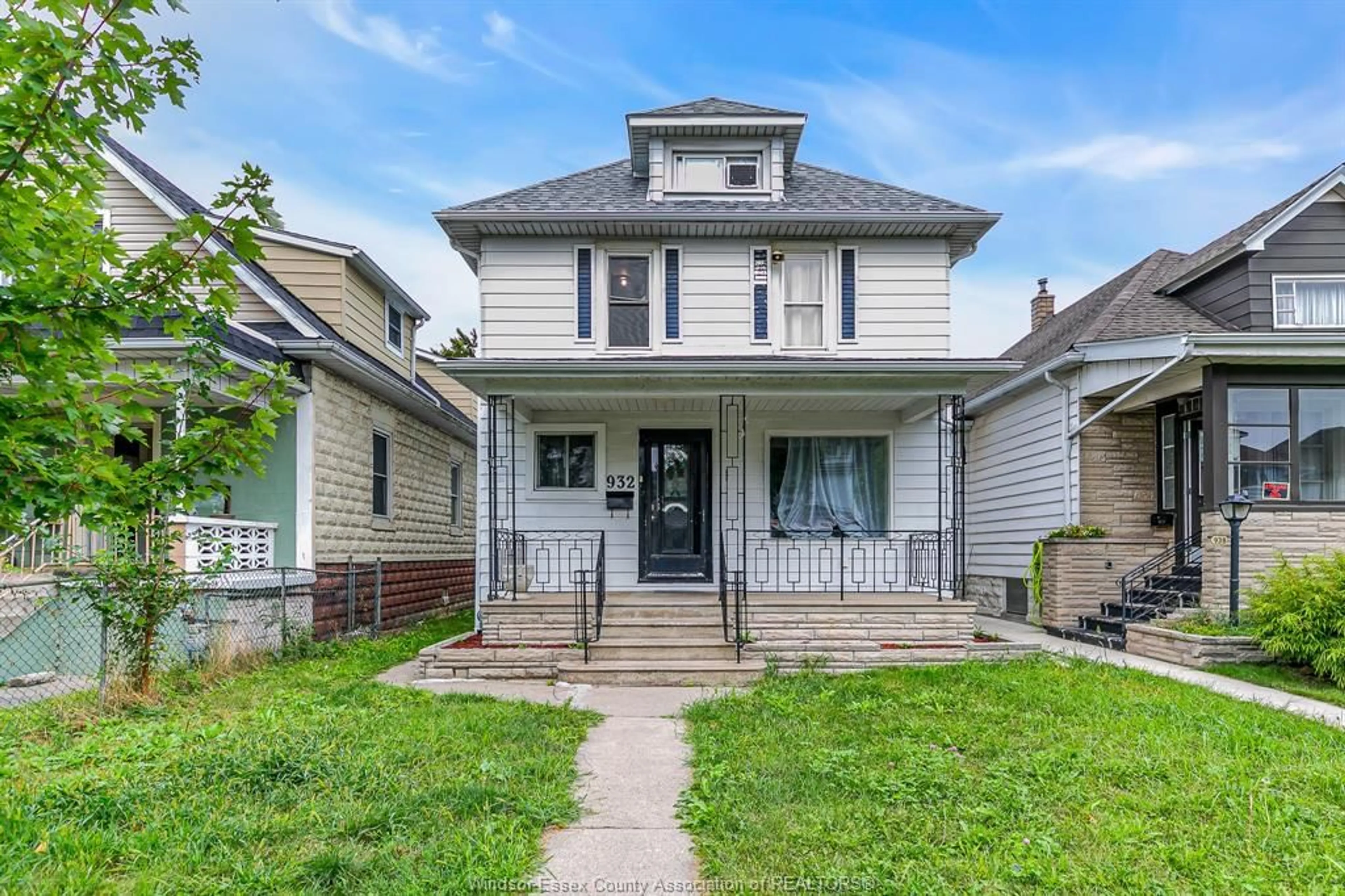 Home with vinyl exterior material, street for 932 HALL Ave, Windsor Ontario N9A 2M5