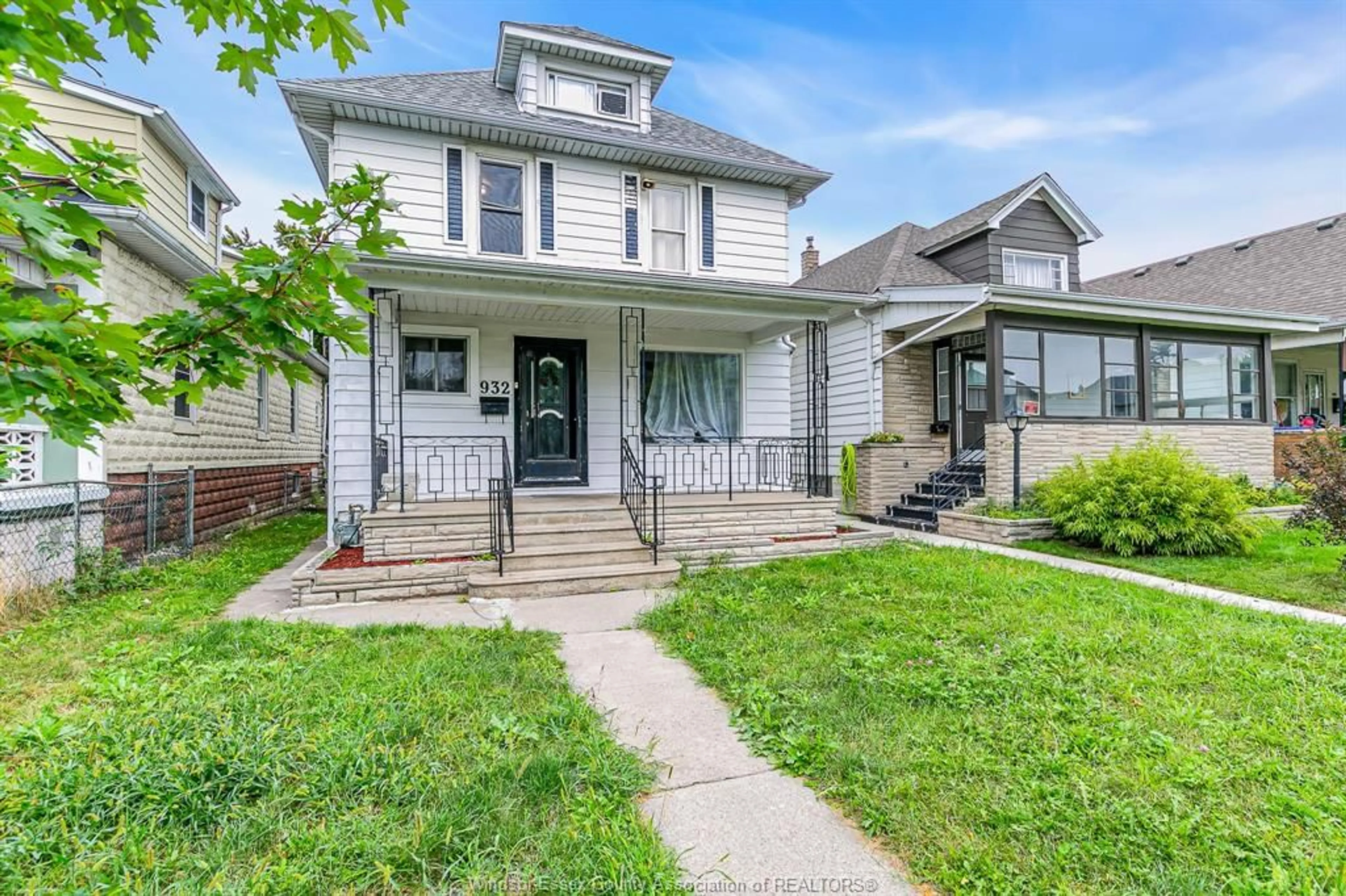 Home with vinyl exterior material, street for 932 HALL Ave, Windsor Ontario N9A 2M5