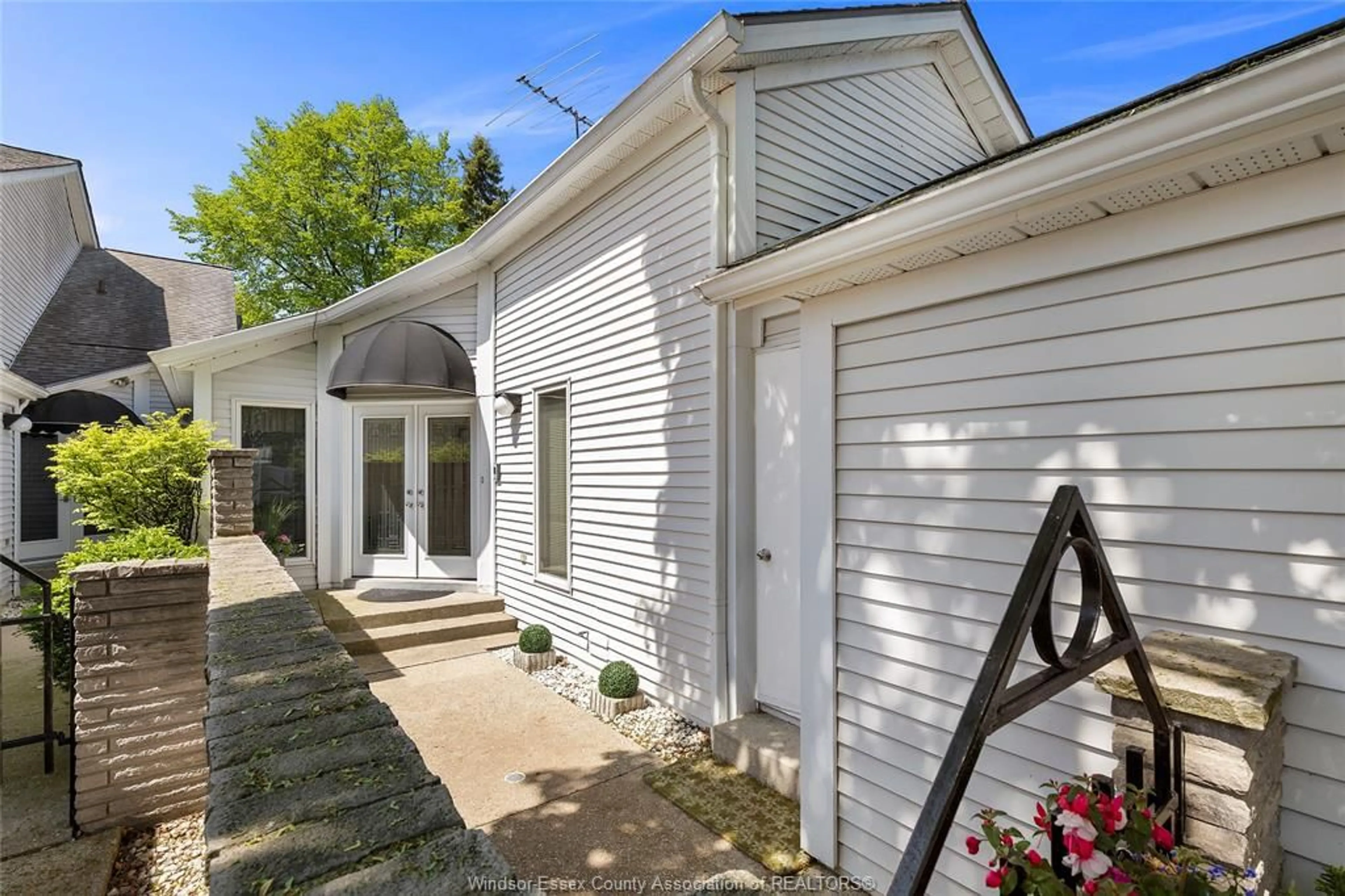 A pic from outside/outdoor area/front of a property/back of a property/a pic from drone, street for 143 MARINE Dr, Tecumseh Ontario N8N 4K1