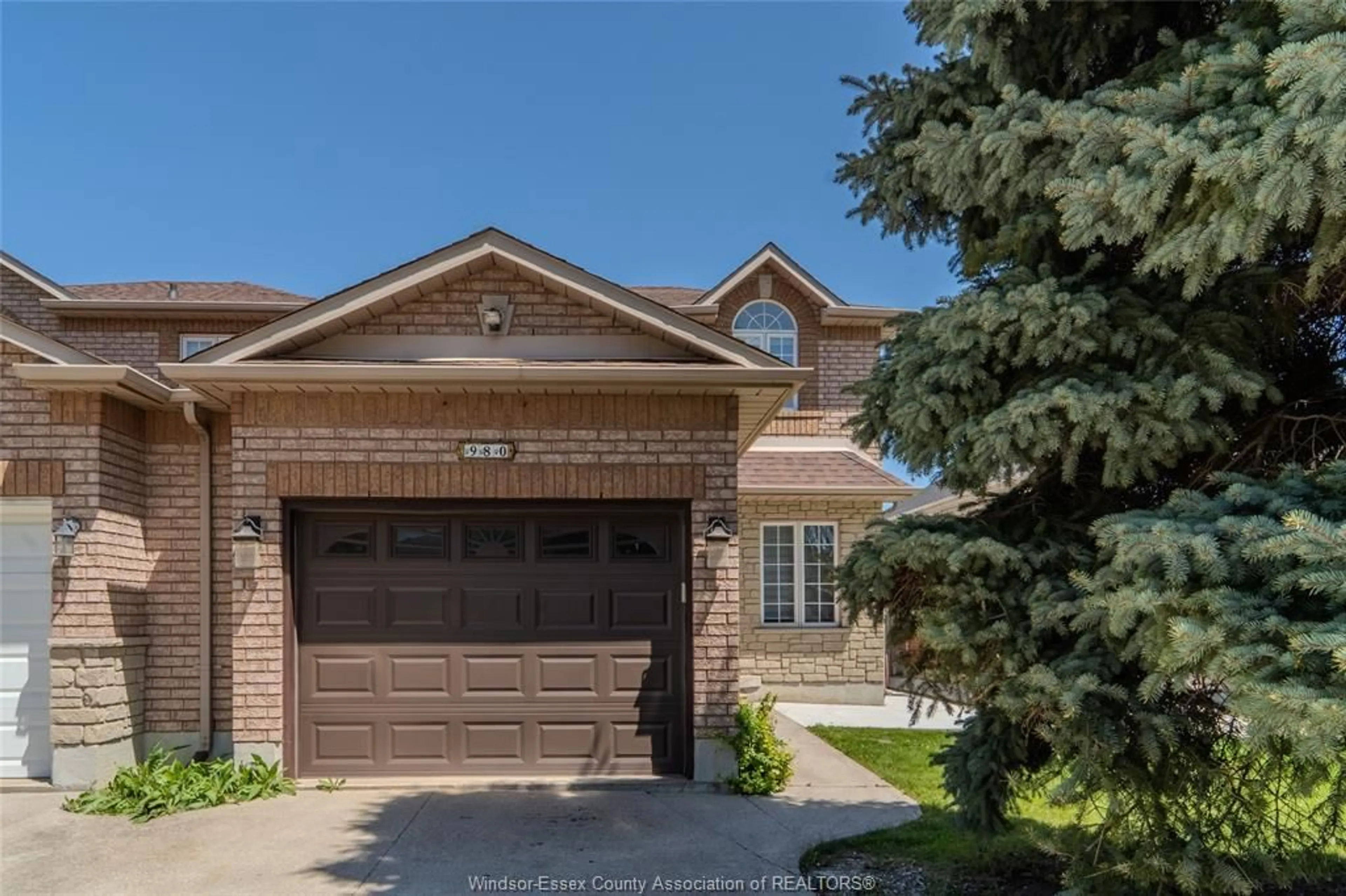 Home with brick exterior material, street for 980 Lemonwood Cres, Windsor Ontario N9G 2R7