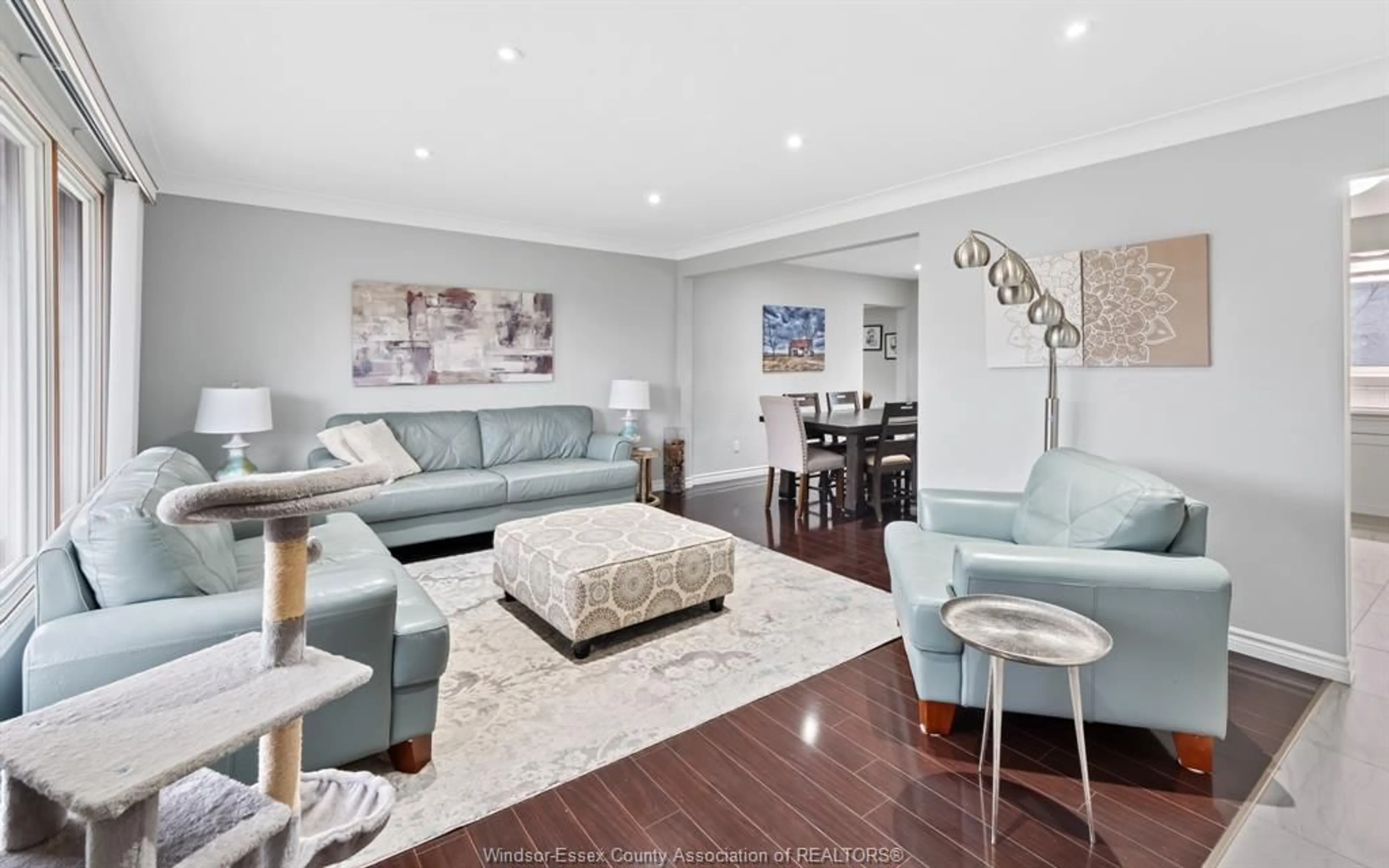 Living room with furniture, wood/laminate floor for 2420 EVERTS, Windsor Ontario N9E 2T7