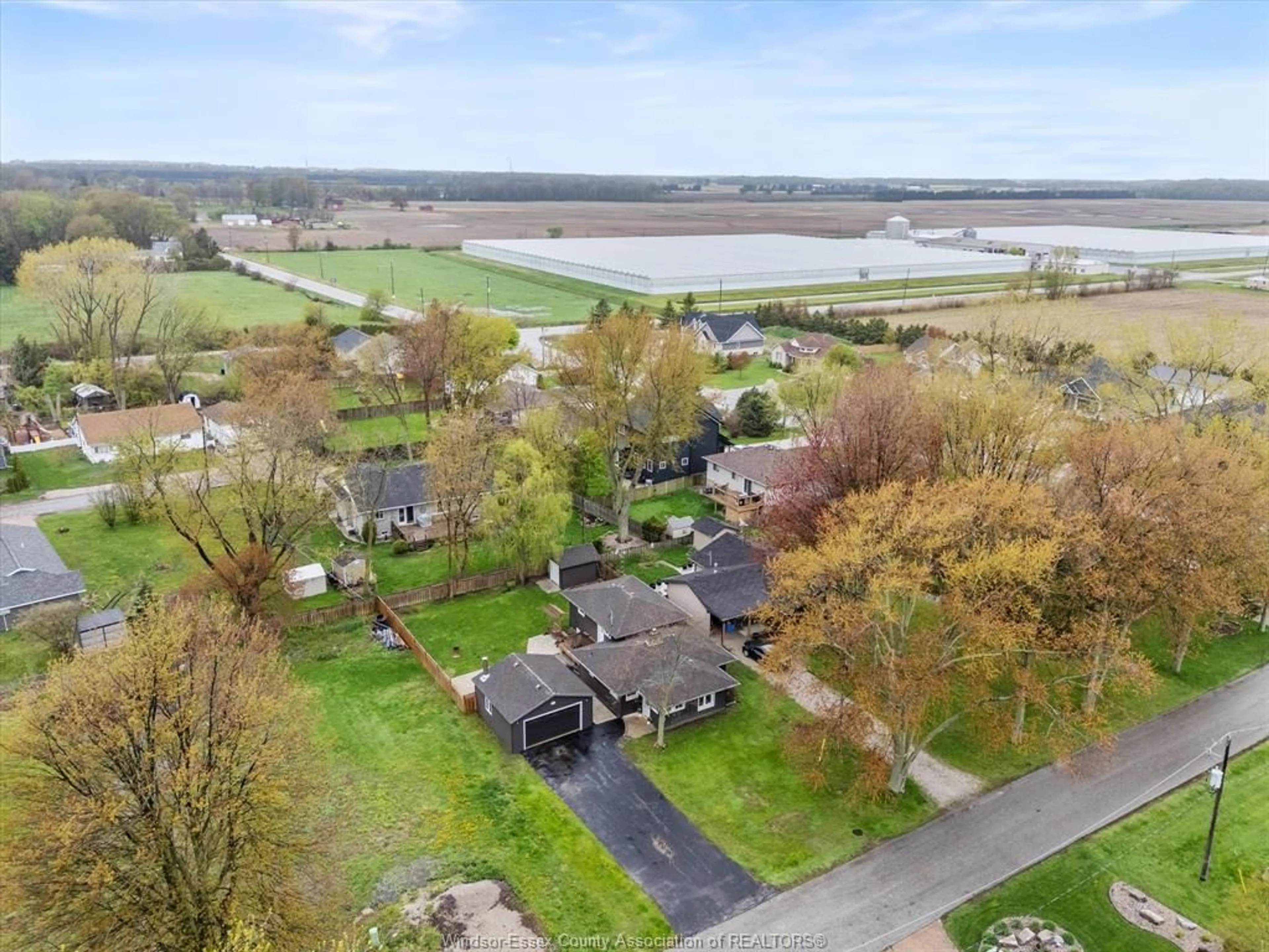 A pic from outside/outdoor area/front of a property/back of a property/a pic from drone, water/lake/river/ocean view for 101 CHELSEA, Kingsville Ontario N9Y 3X3