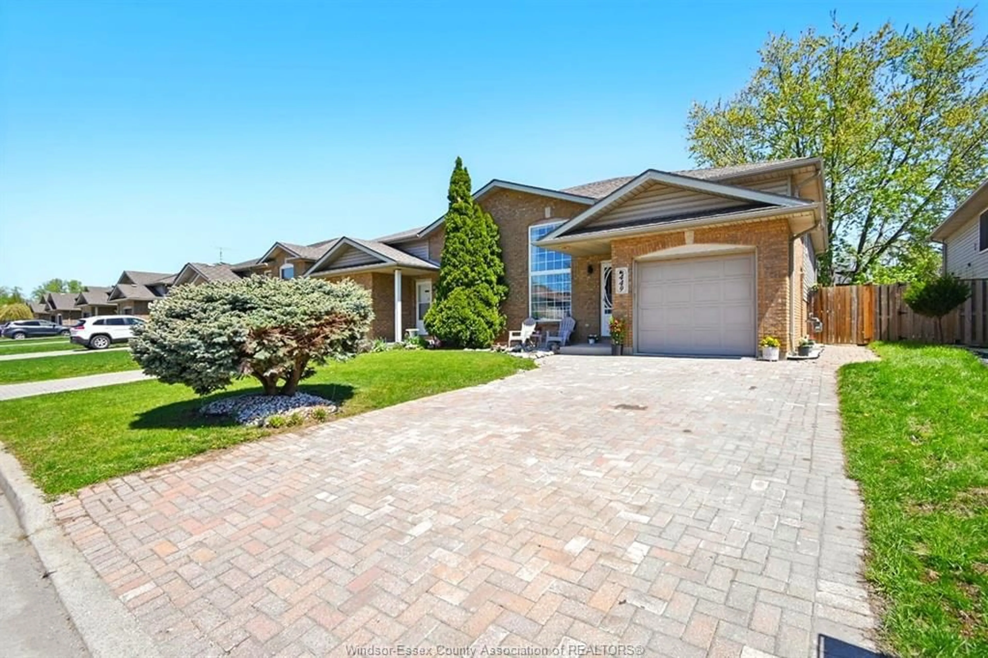 Home with brick exterior material, street for 449 MERRILL Ave, LaSalle Ontario N9J 3N6