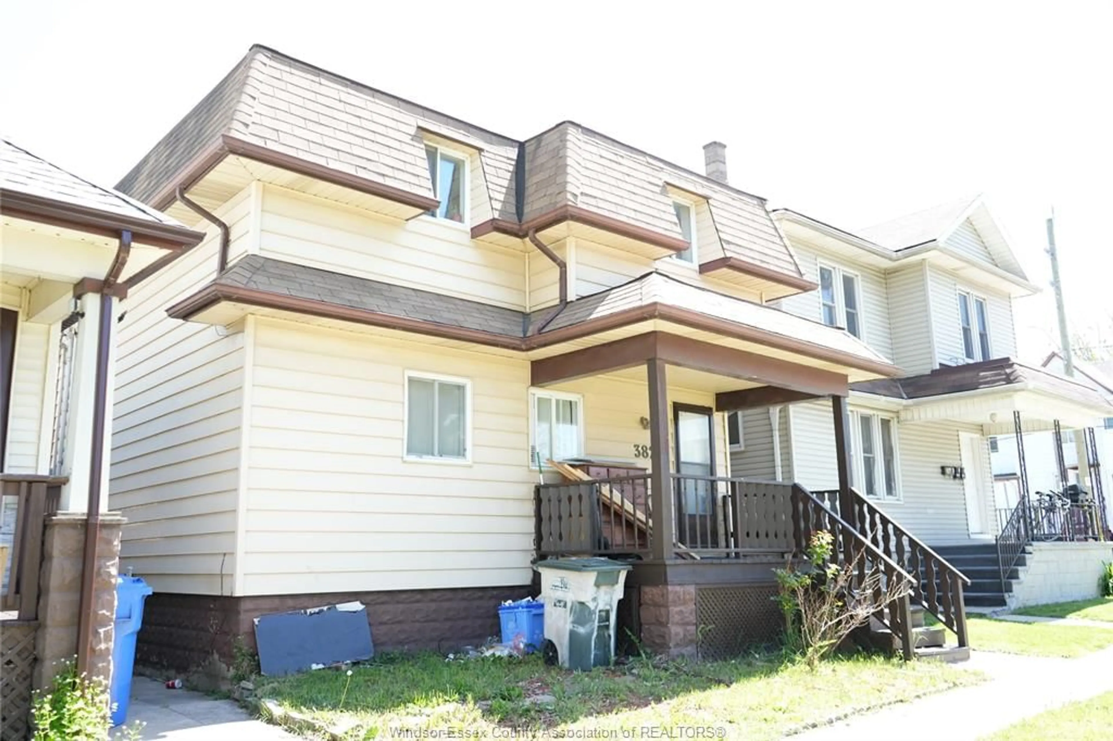 Home with vinyl exterior material, street for 382 Langlois Ave, Windsor Ontario N9A 2G1