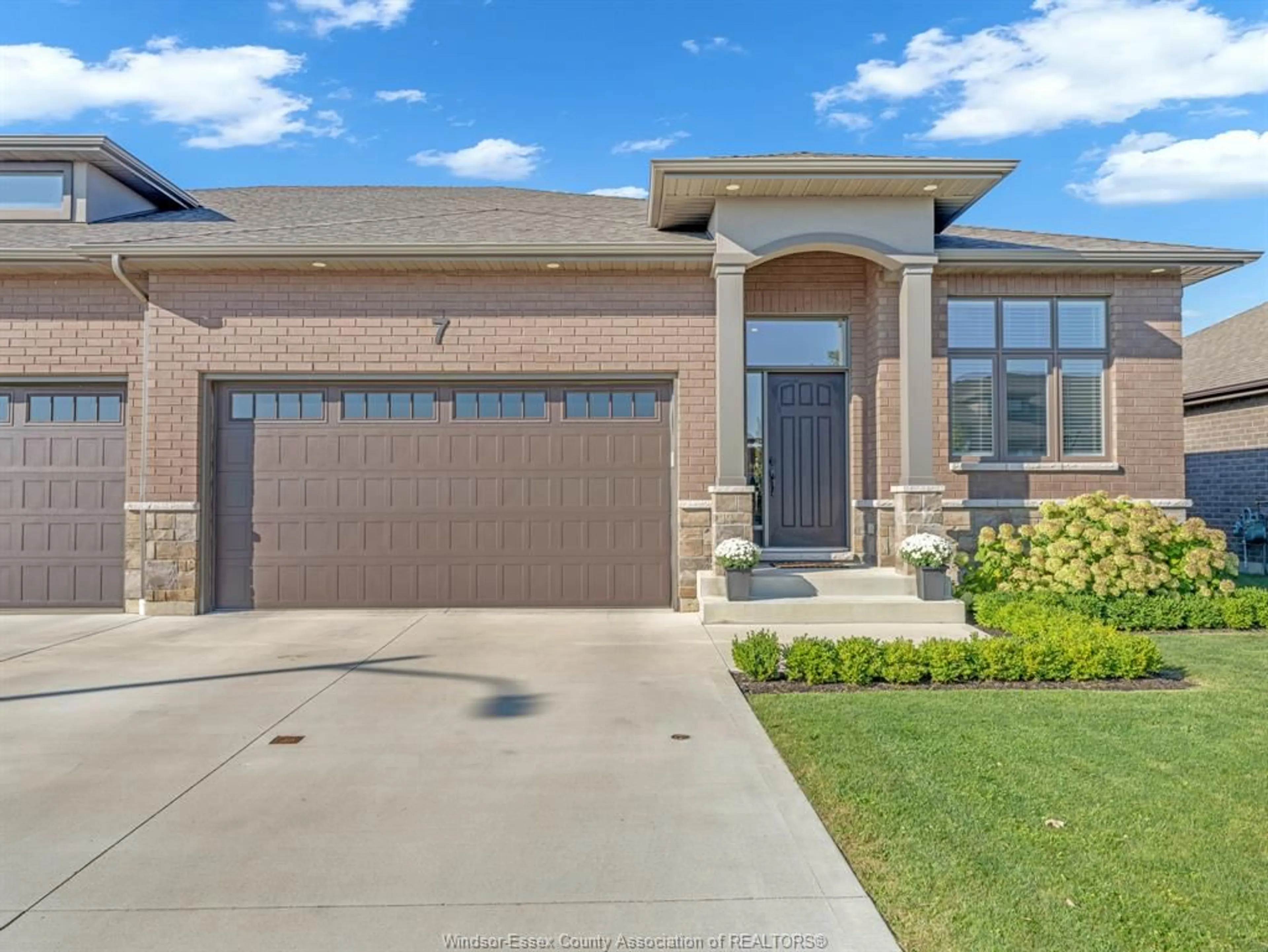 Home with brick exterior material, street for 7 Summerville Ave, Leamington Ontario N8H 0C5