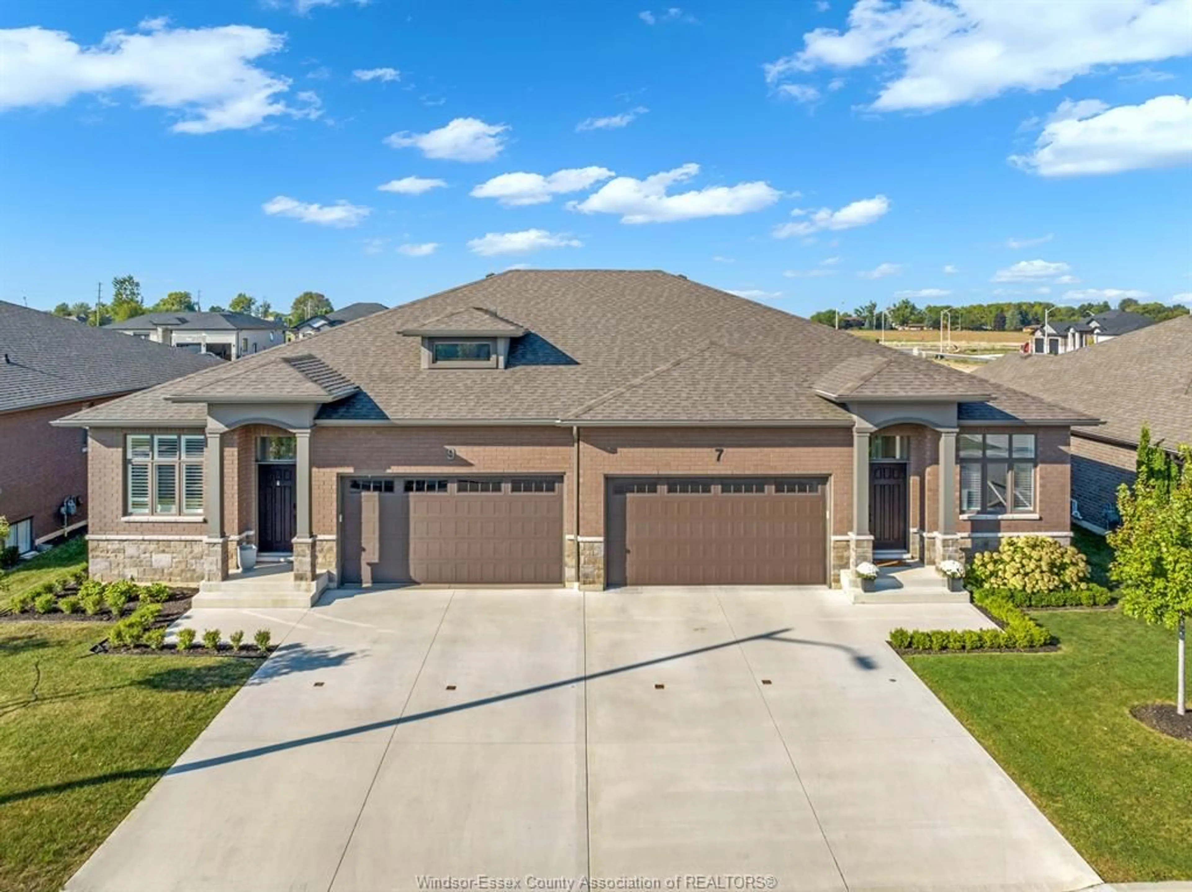 Home with brick exterior material, street for 7 Summerville Ave, Leamington Ontario N8H 0C5