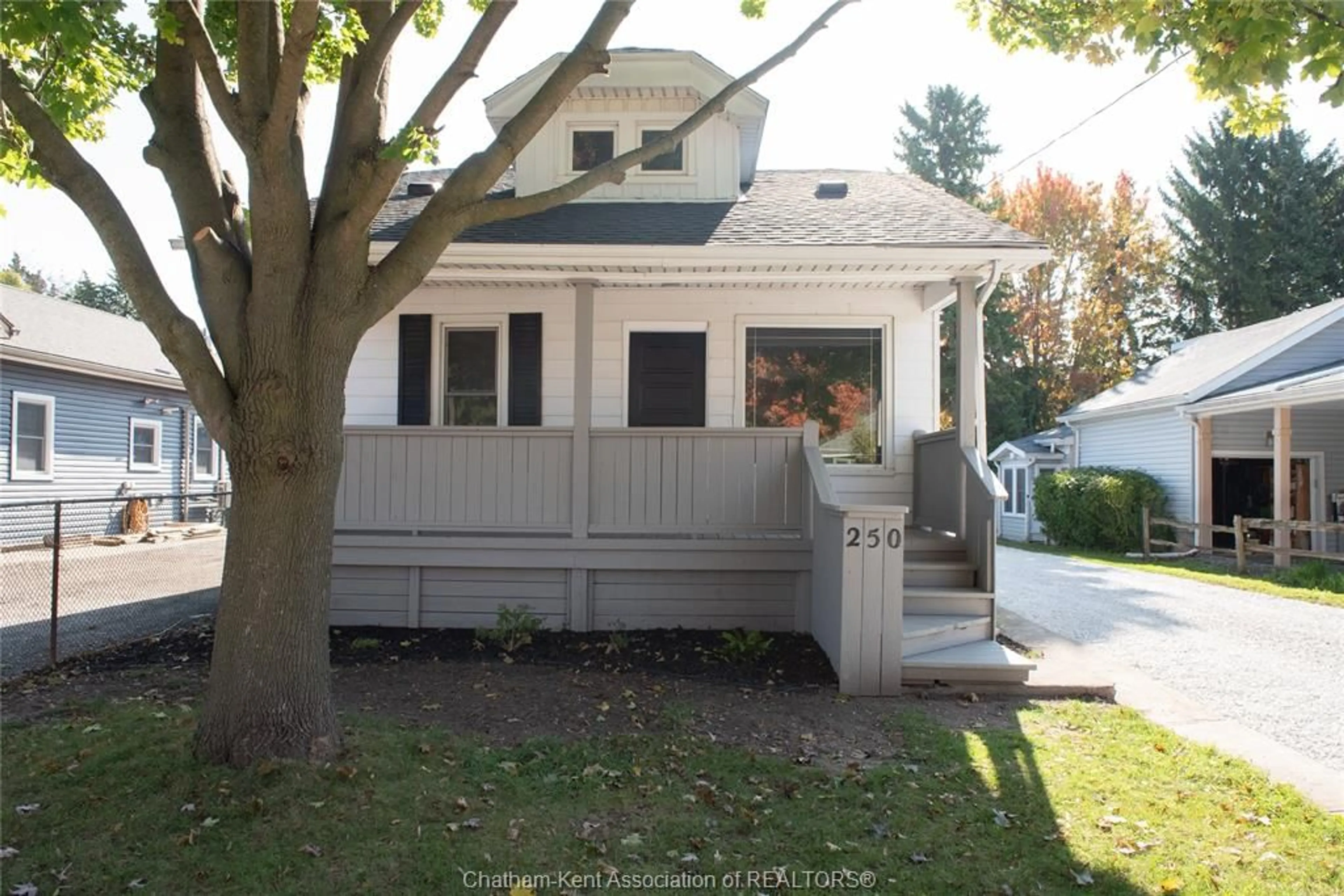 Home with vinyl exterior material, street for 250 Forest St, Chatham Ontario N7L 2A9