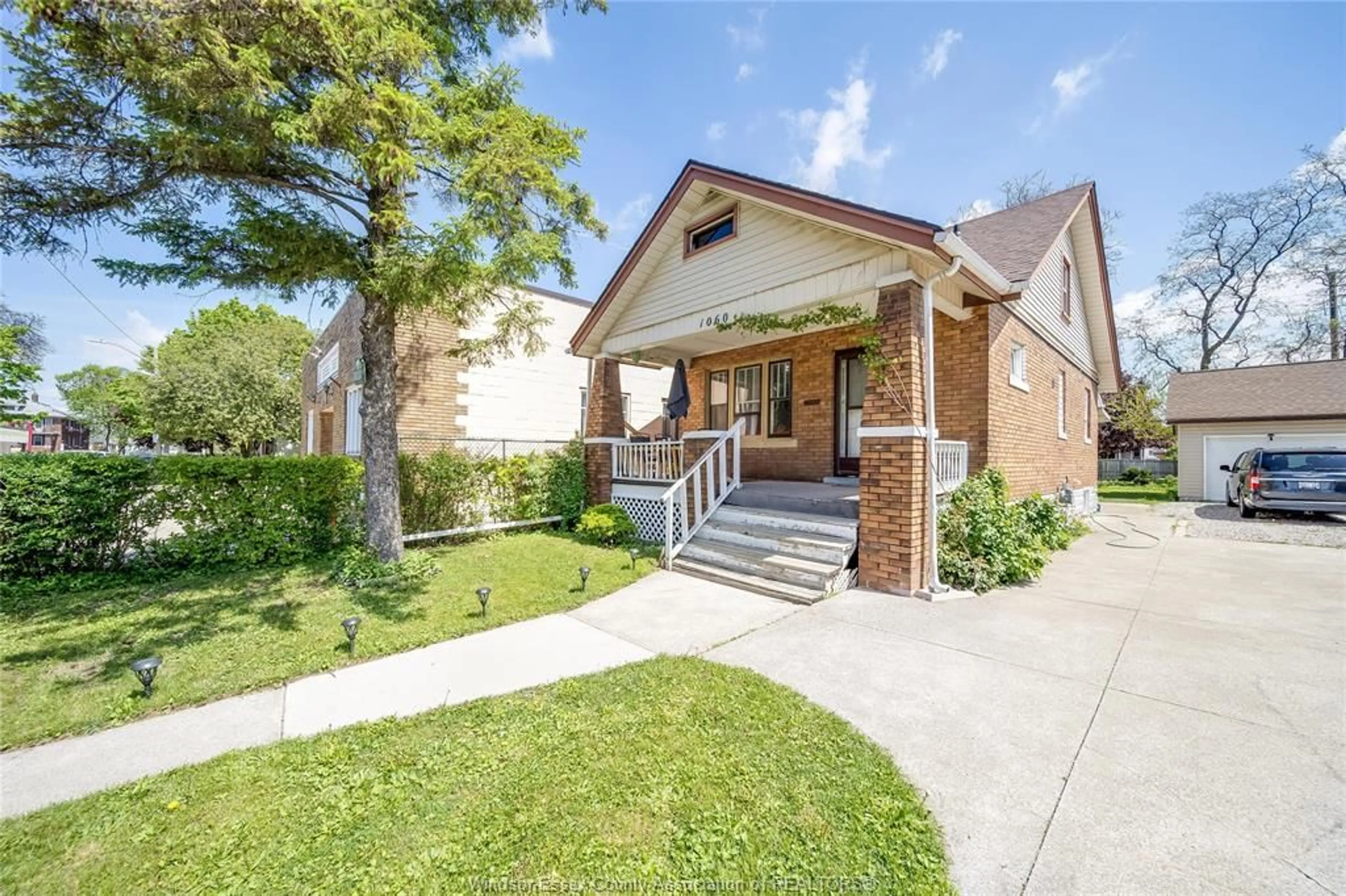 Home with brick exterior material, street for 1060 LANGLOIS, Windsor Ontario N9A 2H5
