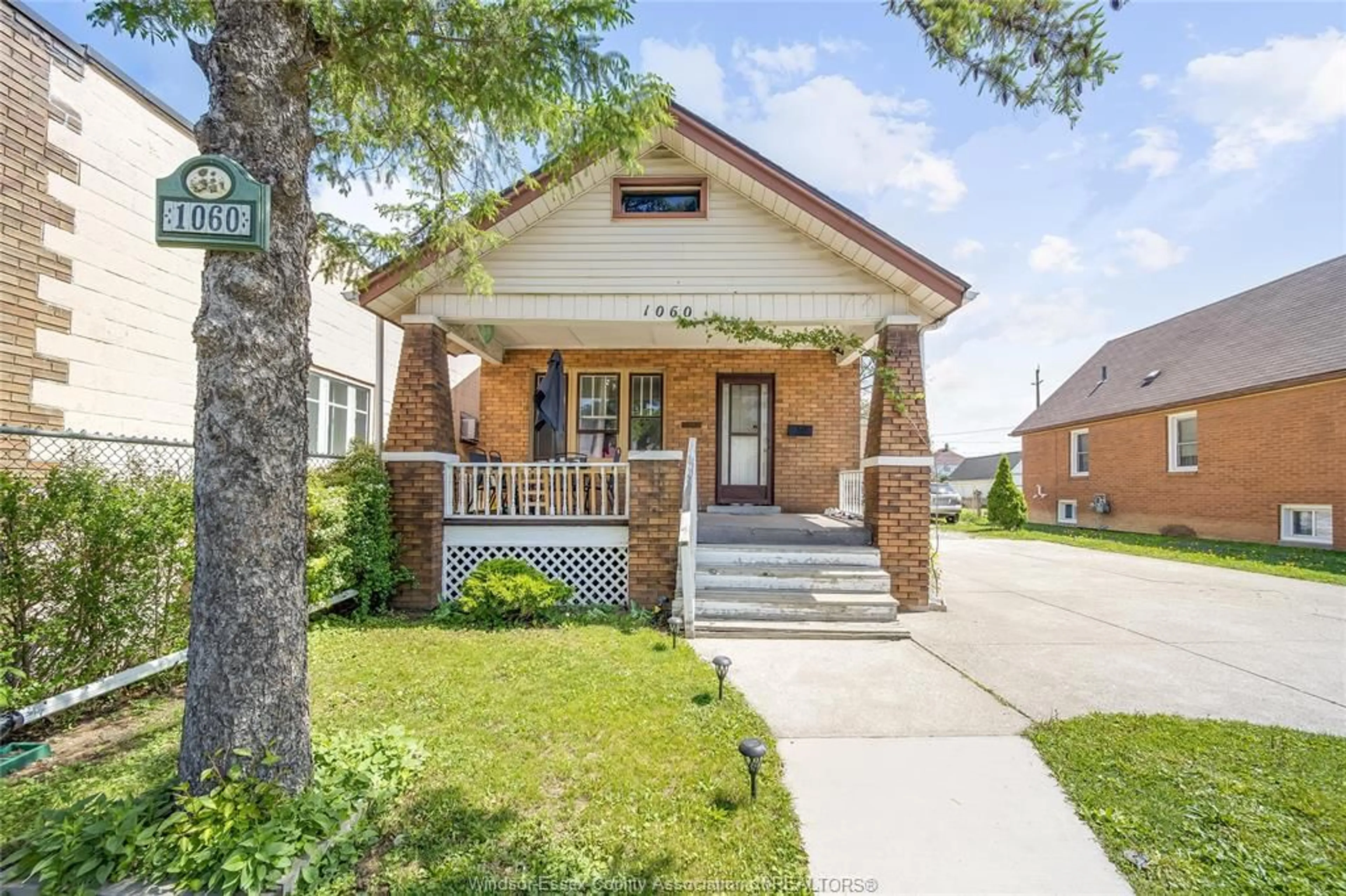 Home with brick exterior material, street for 1060 LANGLOIS, Windsor Ontario N9A 2H5