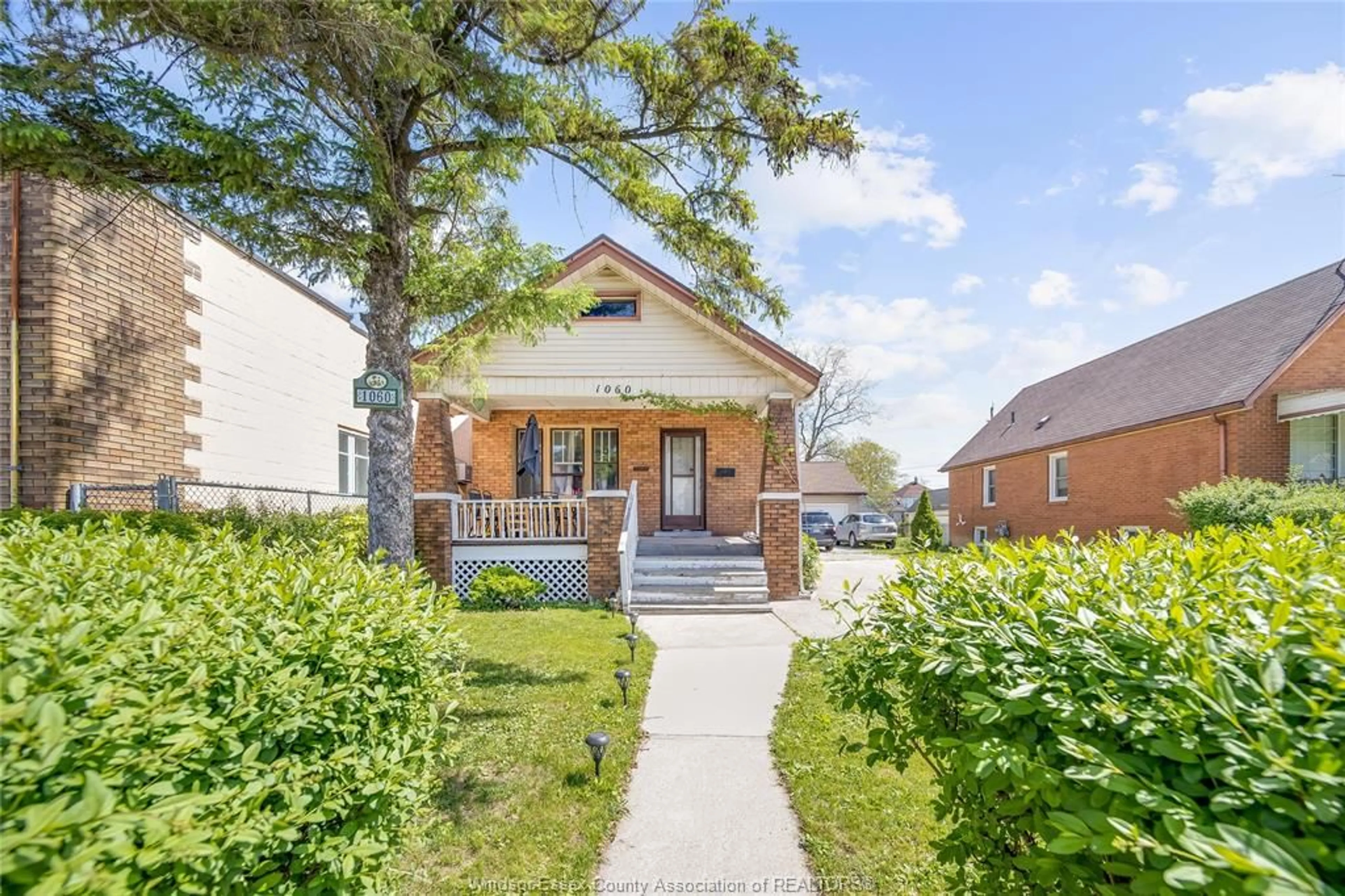 Home with brick exterior material, street for 1060 LANGLOIS, Windsor Ontario N9A 2H5