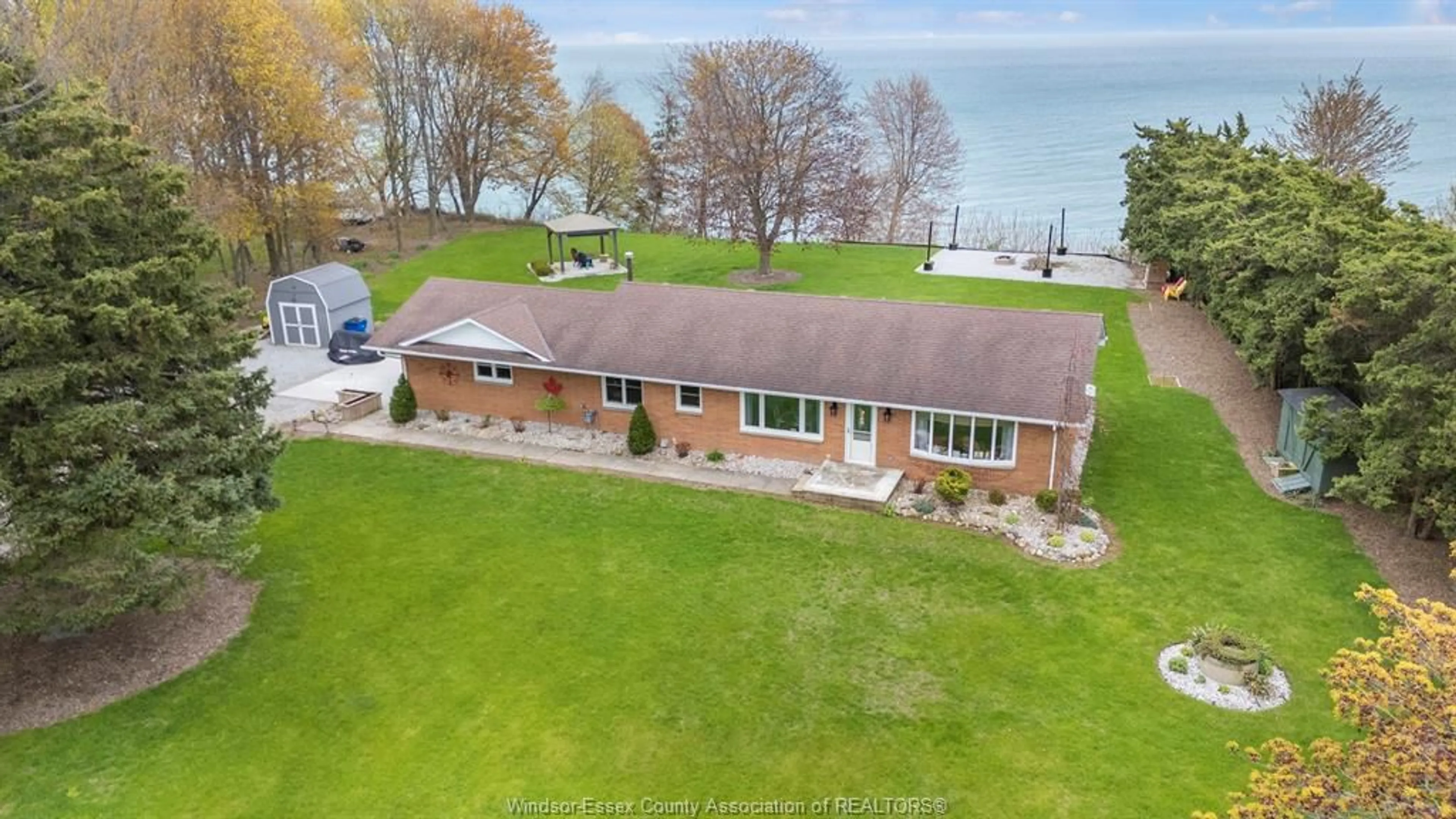 A pic from outside/outdoor area/front of a property/back of a property/a pic from drone, water/lake/river/ocean view for 3356 TALBOT Trail, Wheatley Ontario N0P 2P0